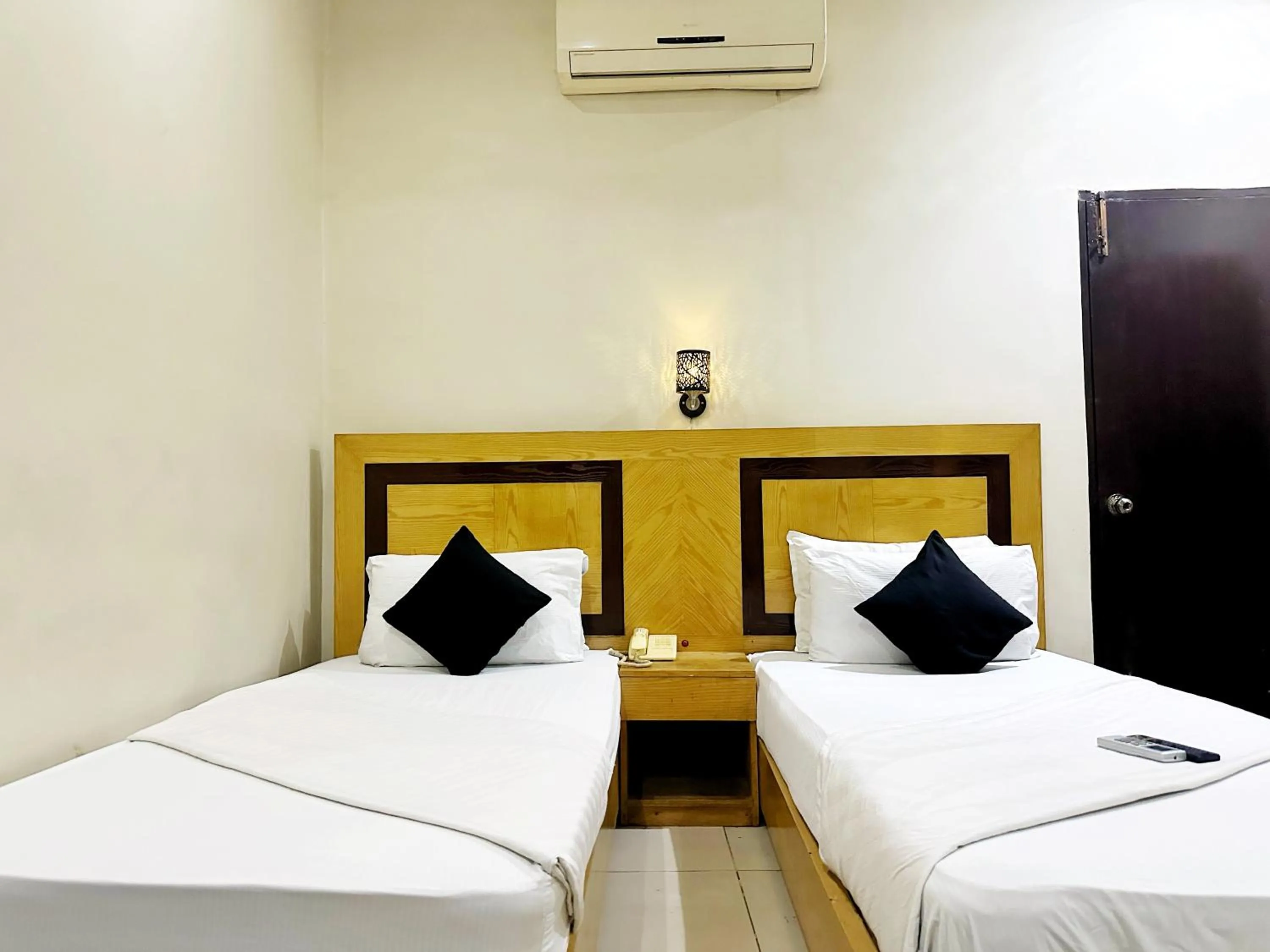 Bed in The Grand Hotel Multan