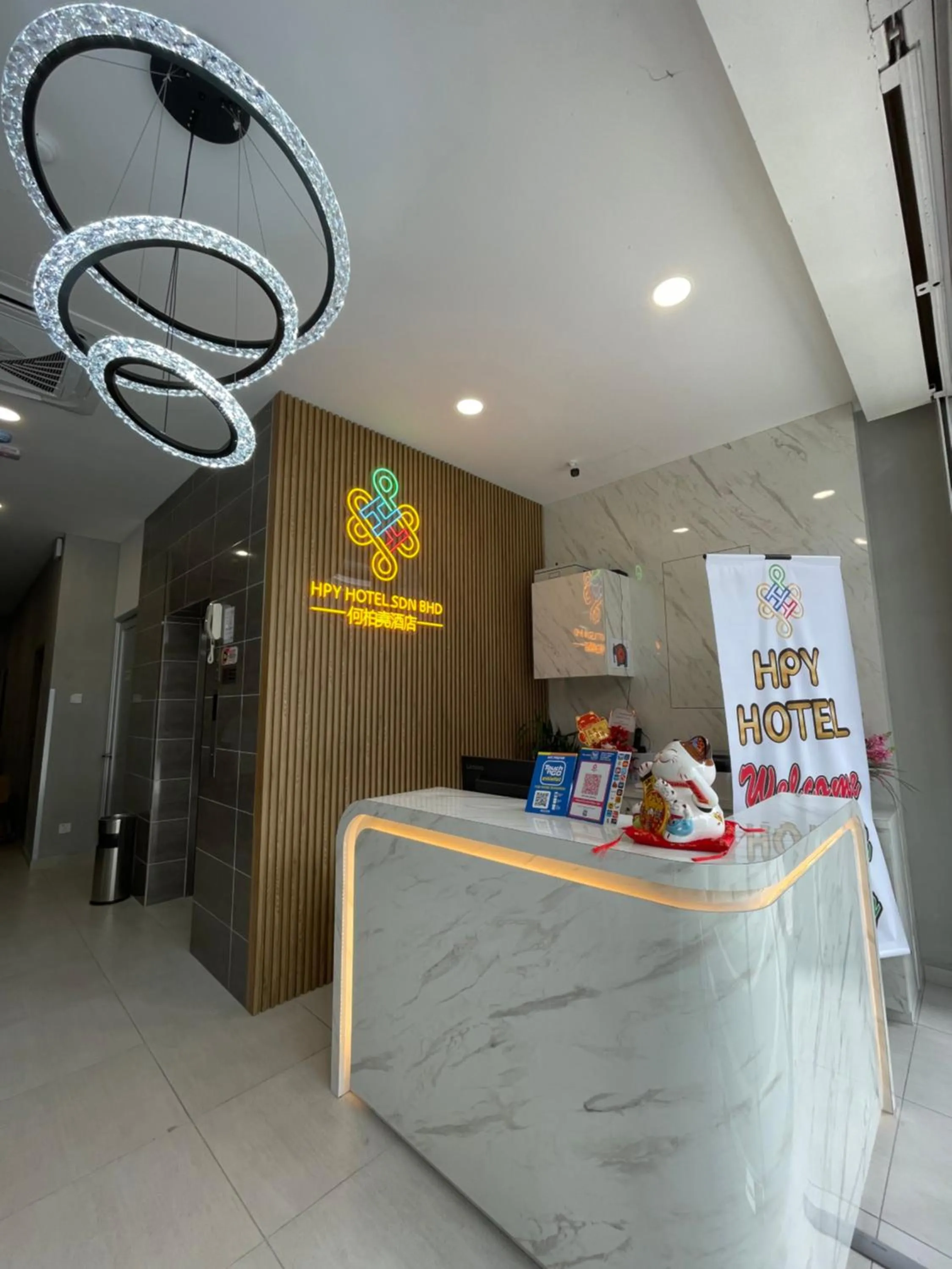 Property logo or sign in HPY Hotel