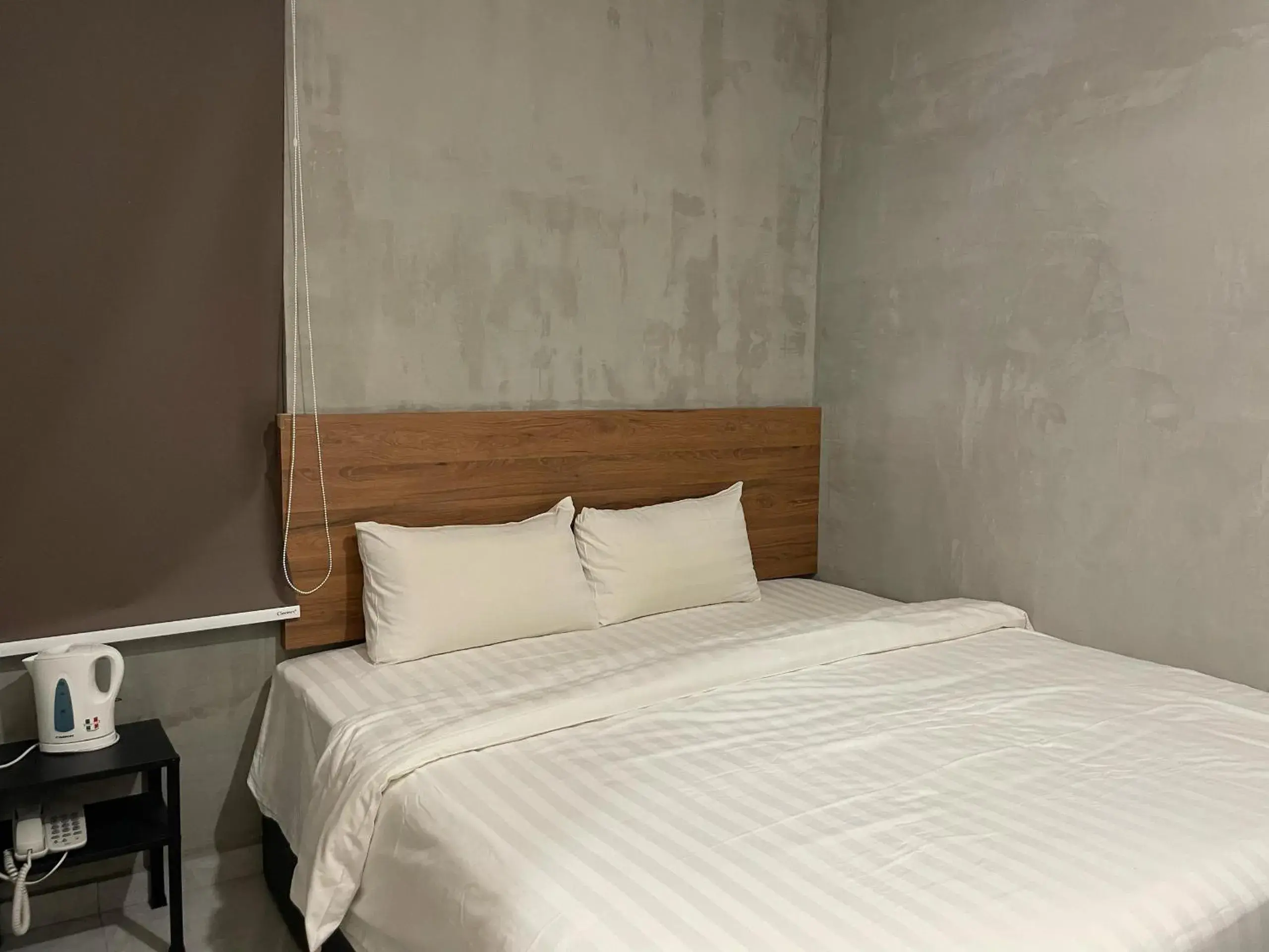 Bed in HPY Hotel Bed in HPY Hotel