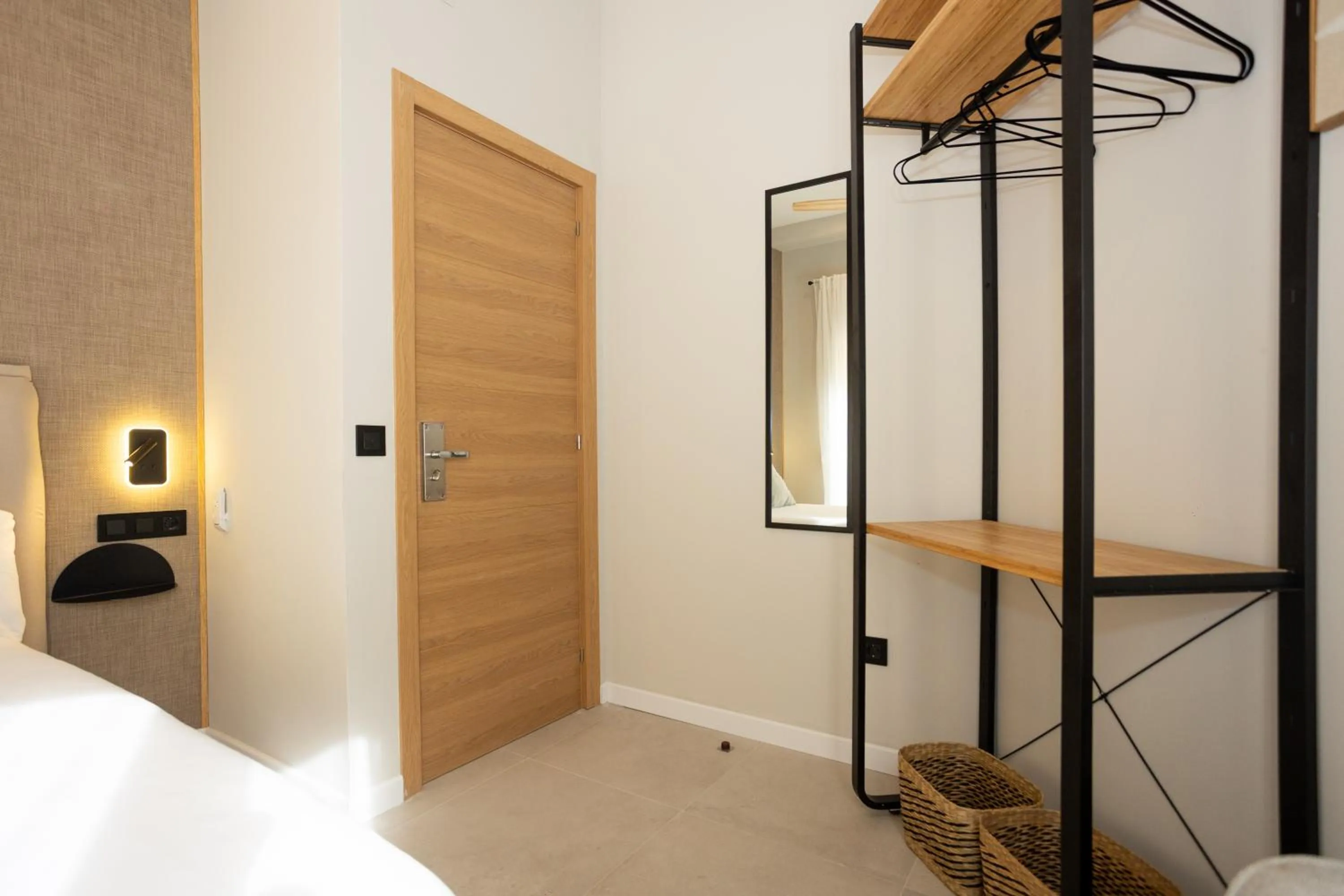 Bed in Chinitas Urban Rooms