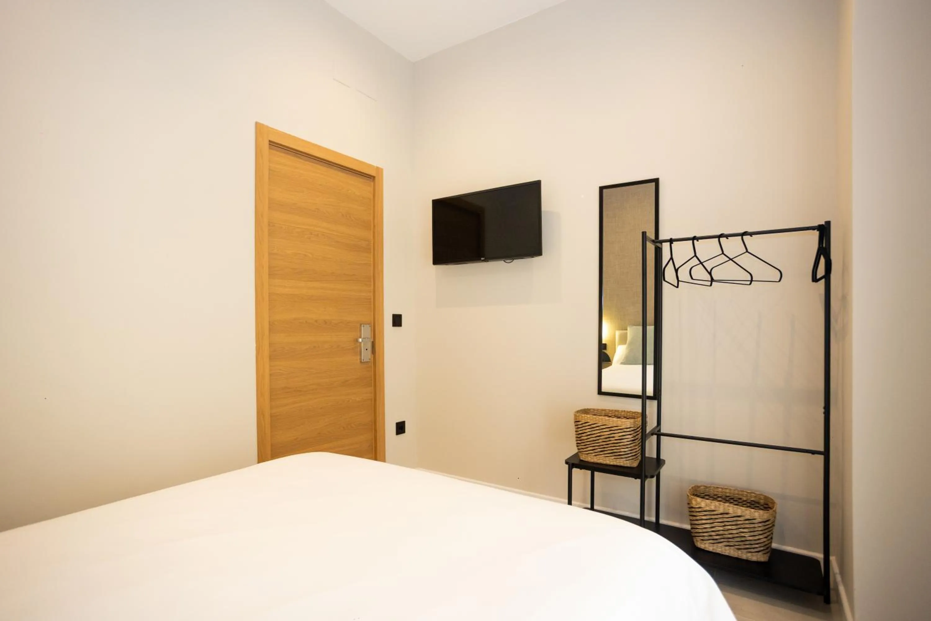 Bed in Chinitas Urban Rooms