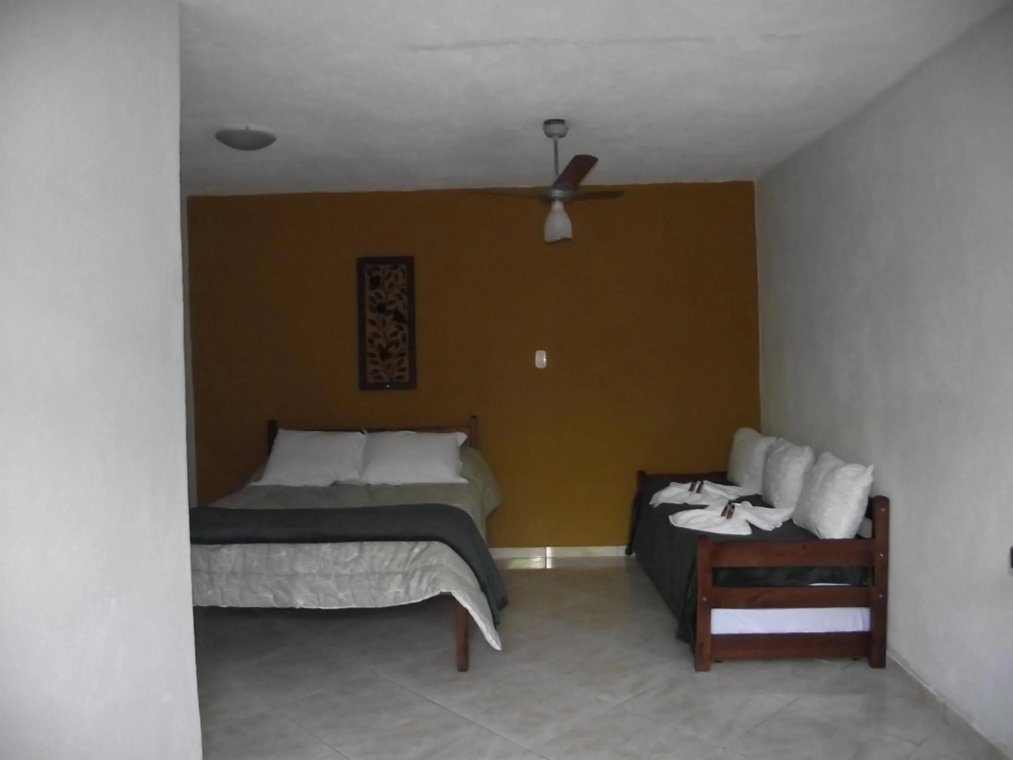 Photo of the whole room, Bed in Pousada Mar & Vida e Doçaria