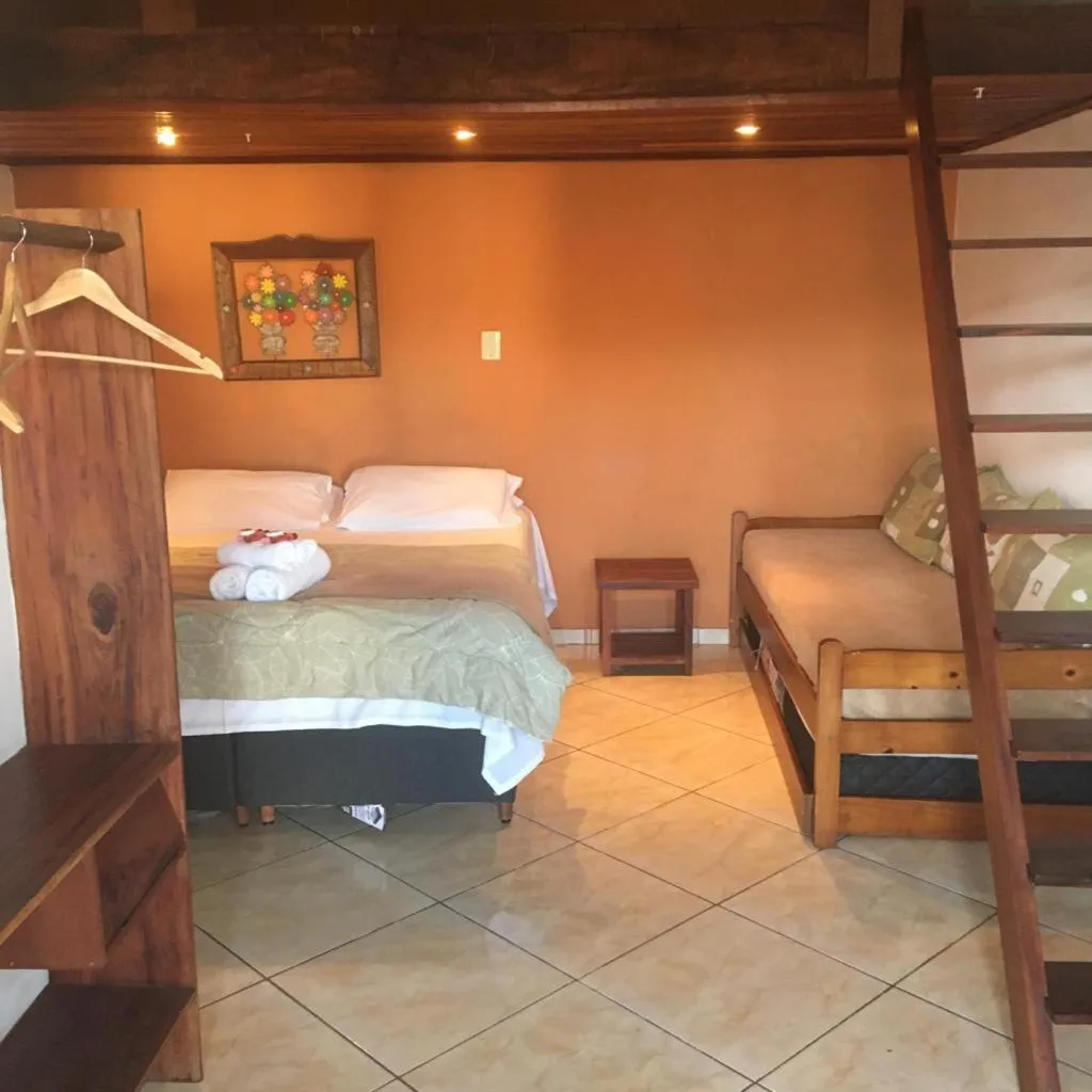 Photo of the whole room, Bed in Pousada Mar & Vida e Doçaria