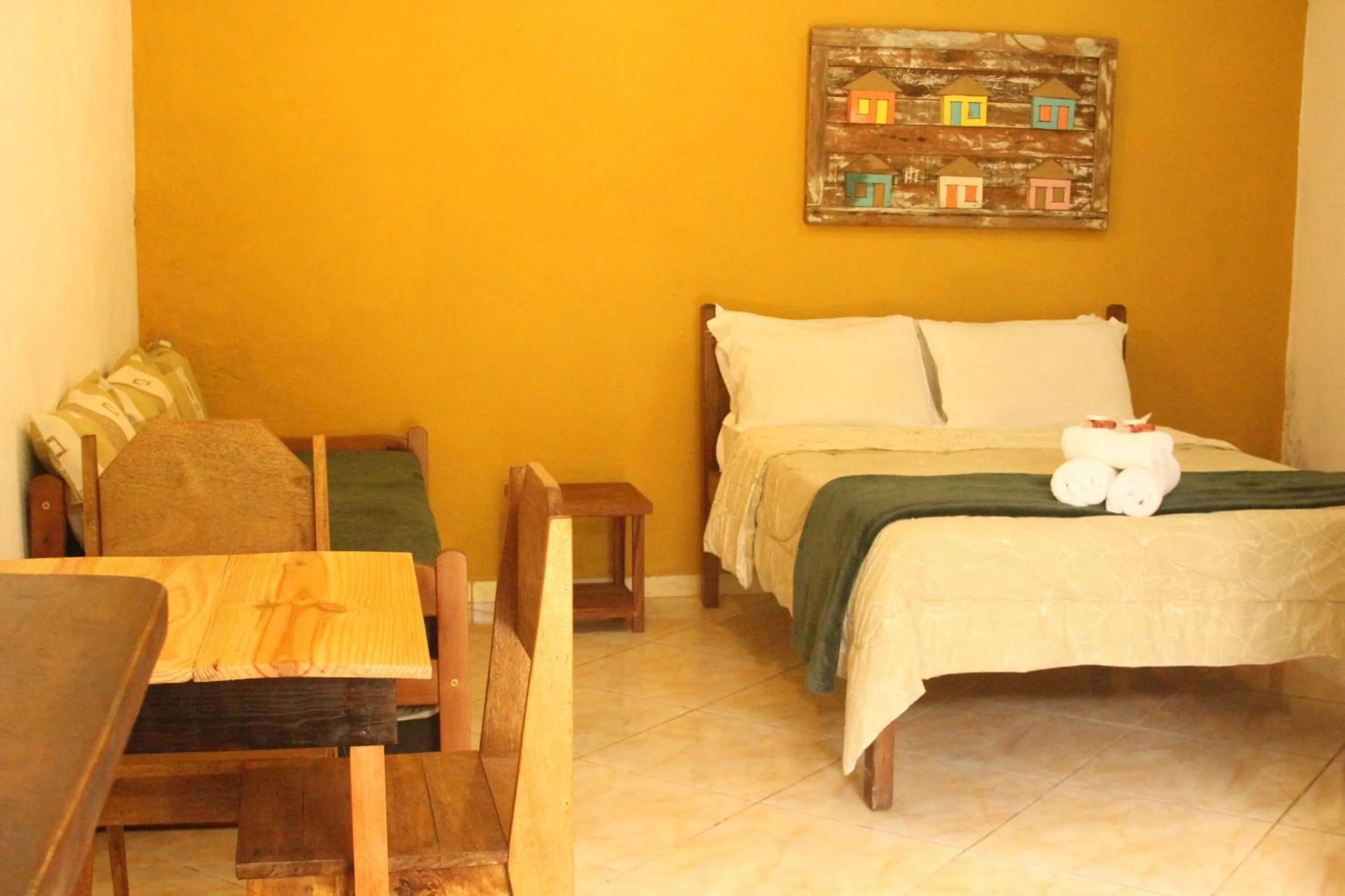 Bed in Pousada Mar & Vida e Doçaria