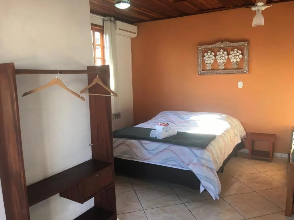 Photo of the whole room, Bed in Pousada Mar & Vida e Doçaria