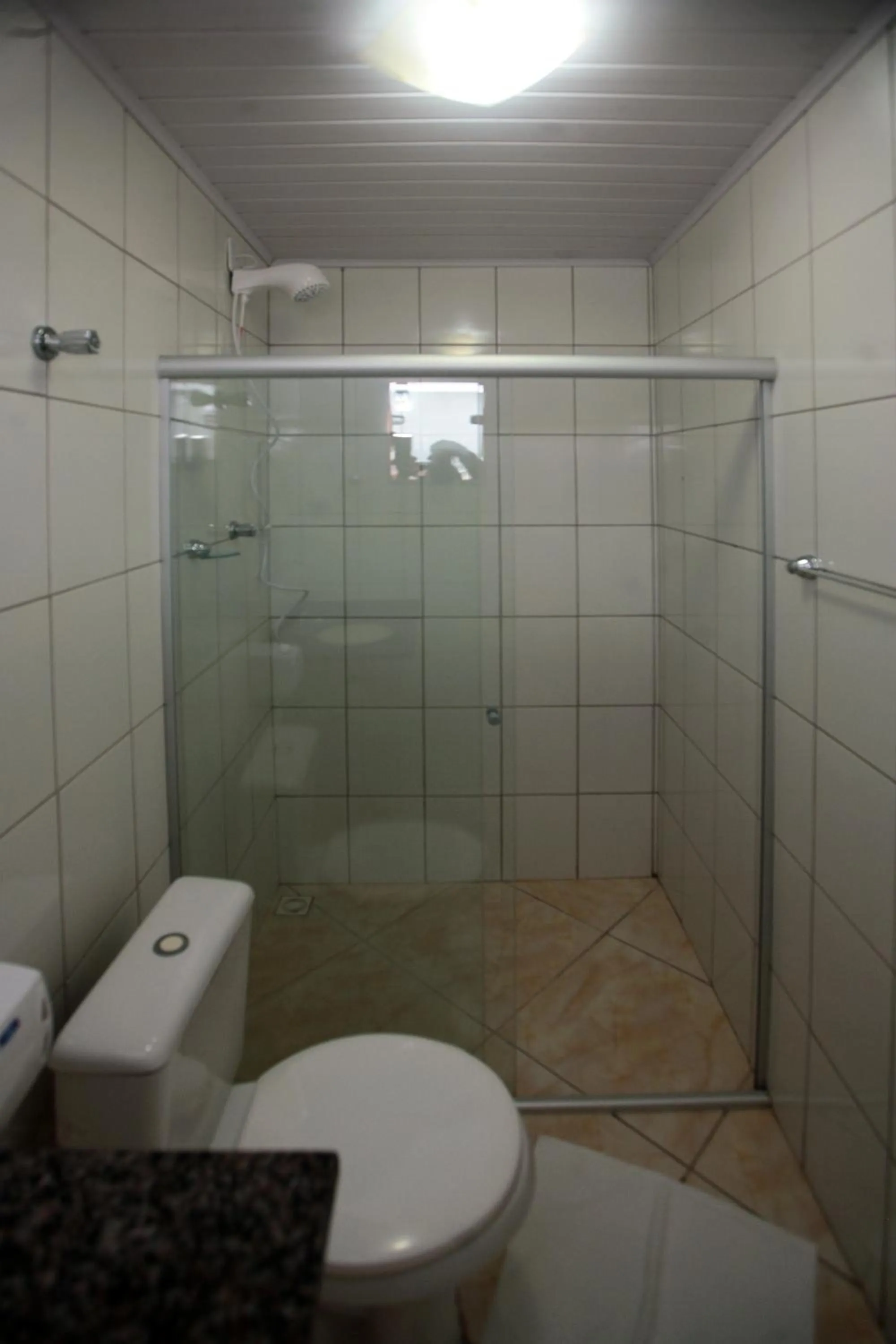 Toilet in Pousada Mar & Vida e Doçaria