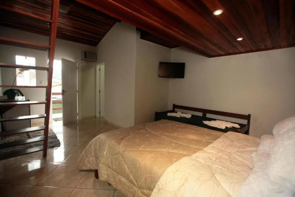 Photo of the whole room, Bed in Pousada Mar & Vida e Doçaria