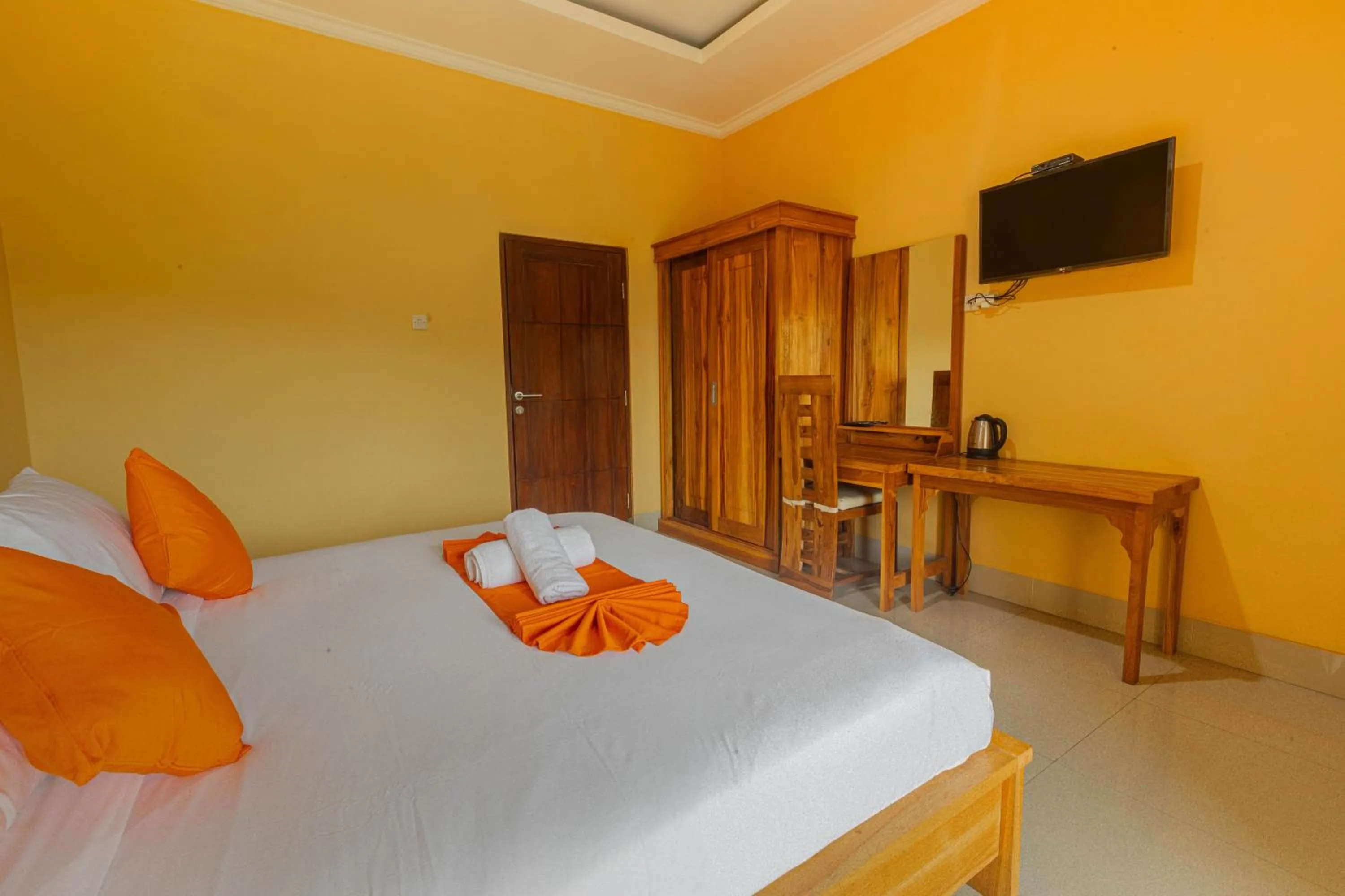 Bed in Srinadi Waterpark Villa