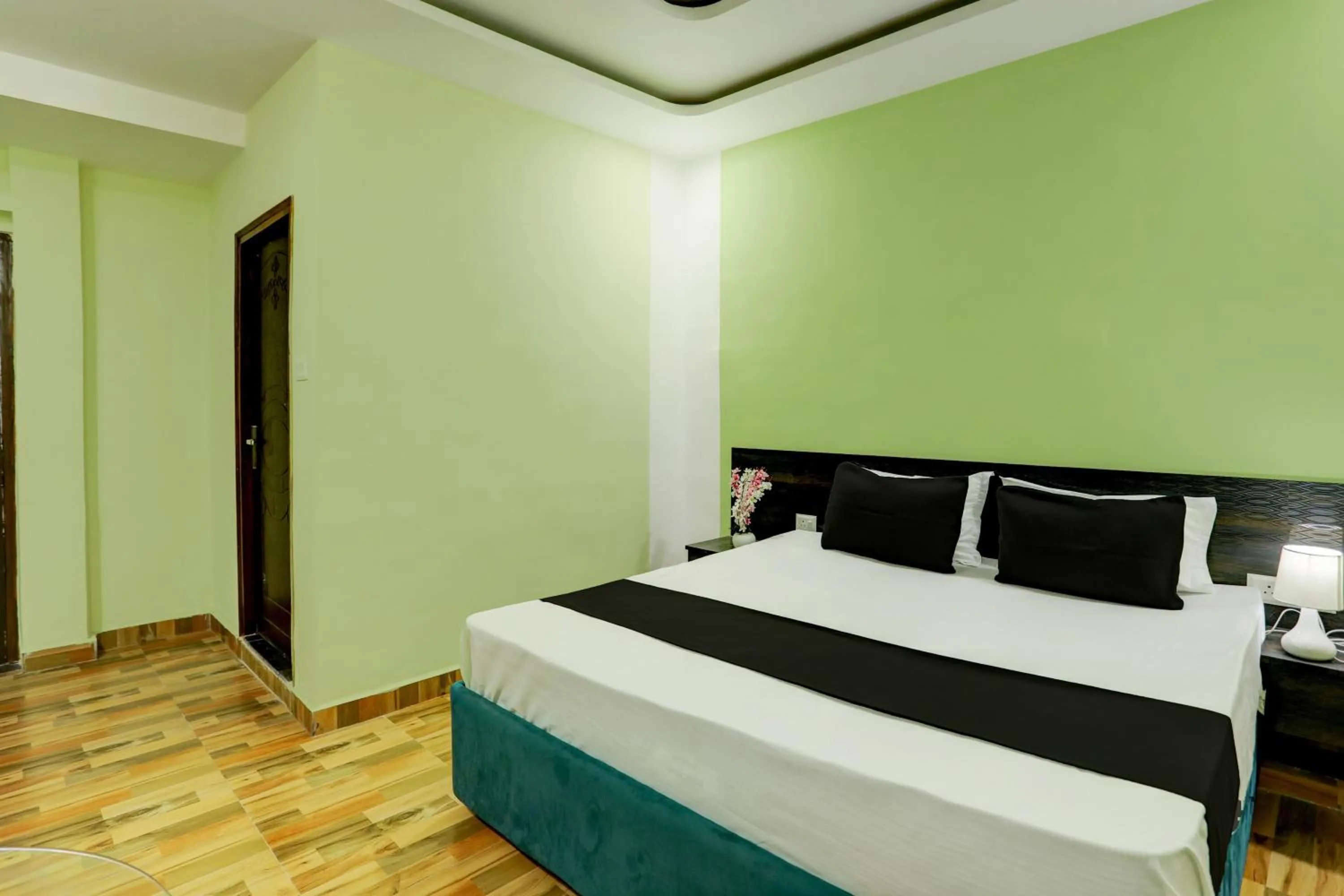 Bedroom, Bed in Hotel O Raisi Residency Hotel