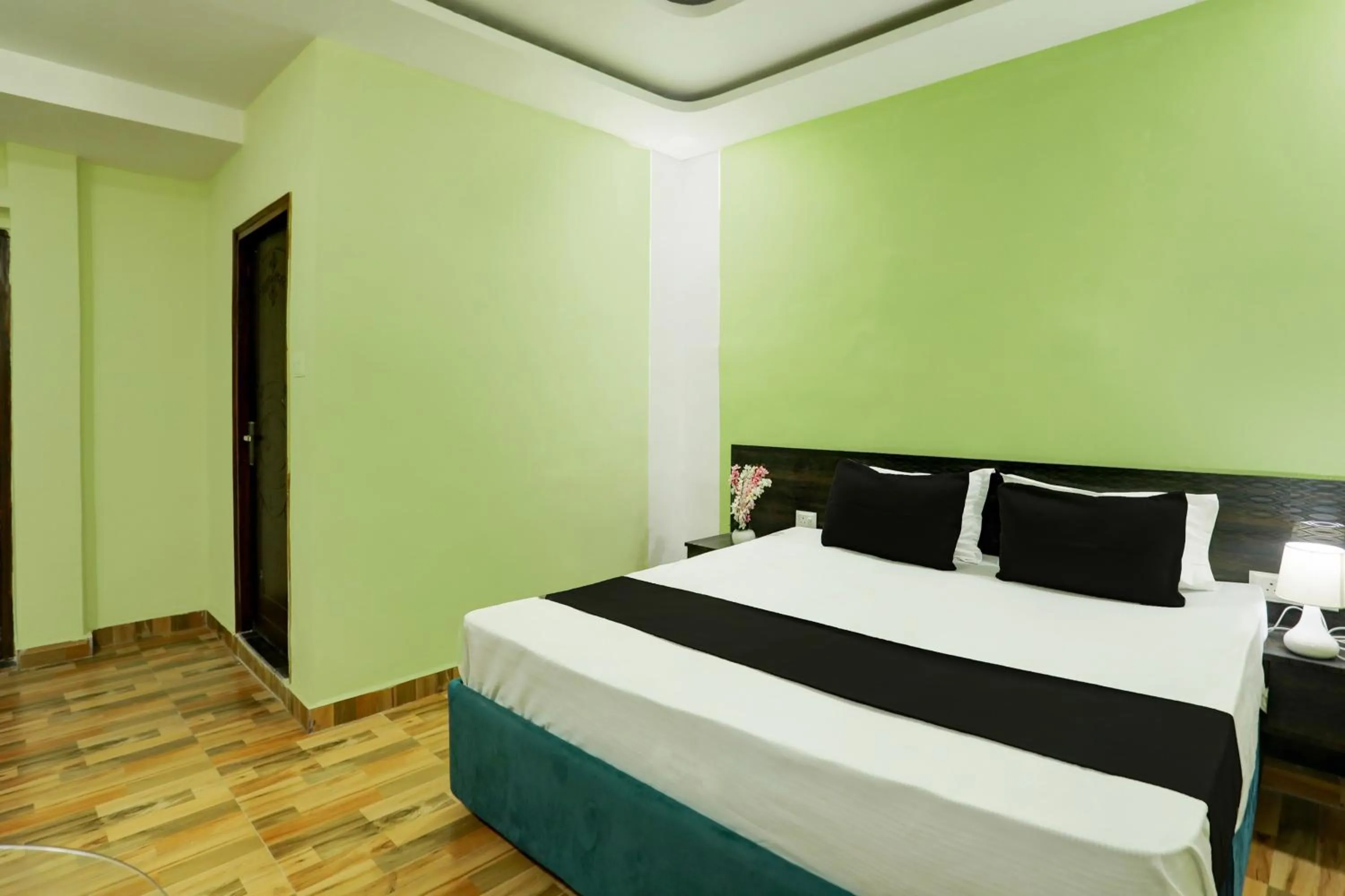 Bedroom, Bed in Hotel O Raisi Residency Hotel