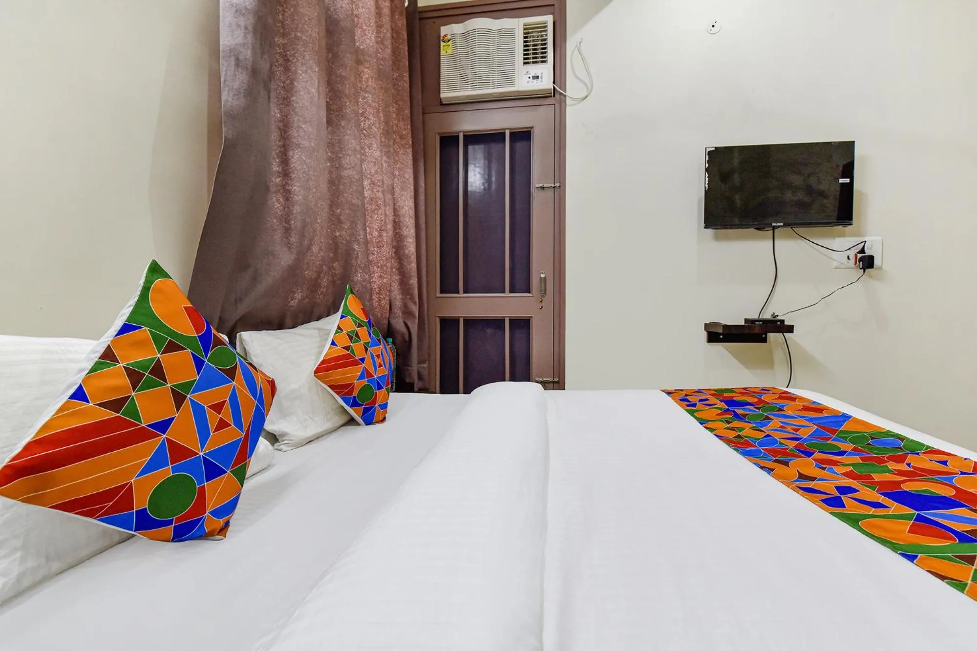 Bed in FabHotel Moon Light Palace