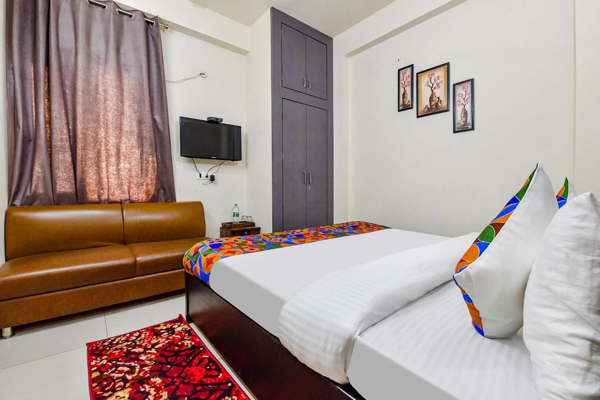 Bed in FabHotel Moon Light Palace