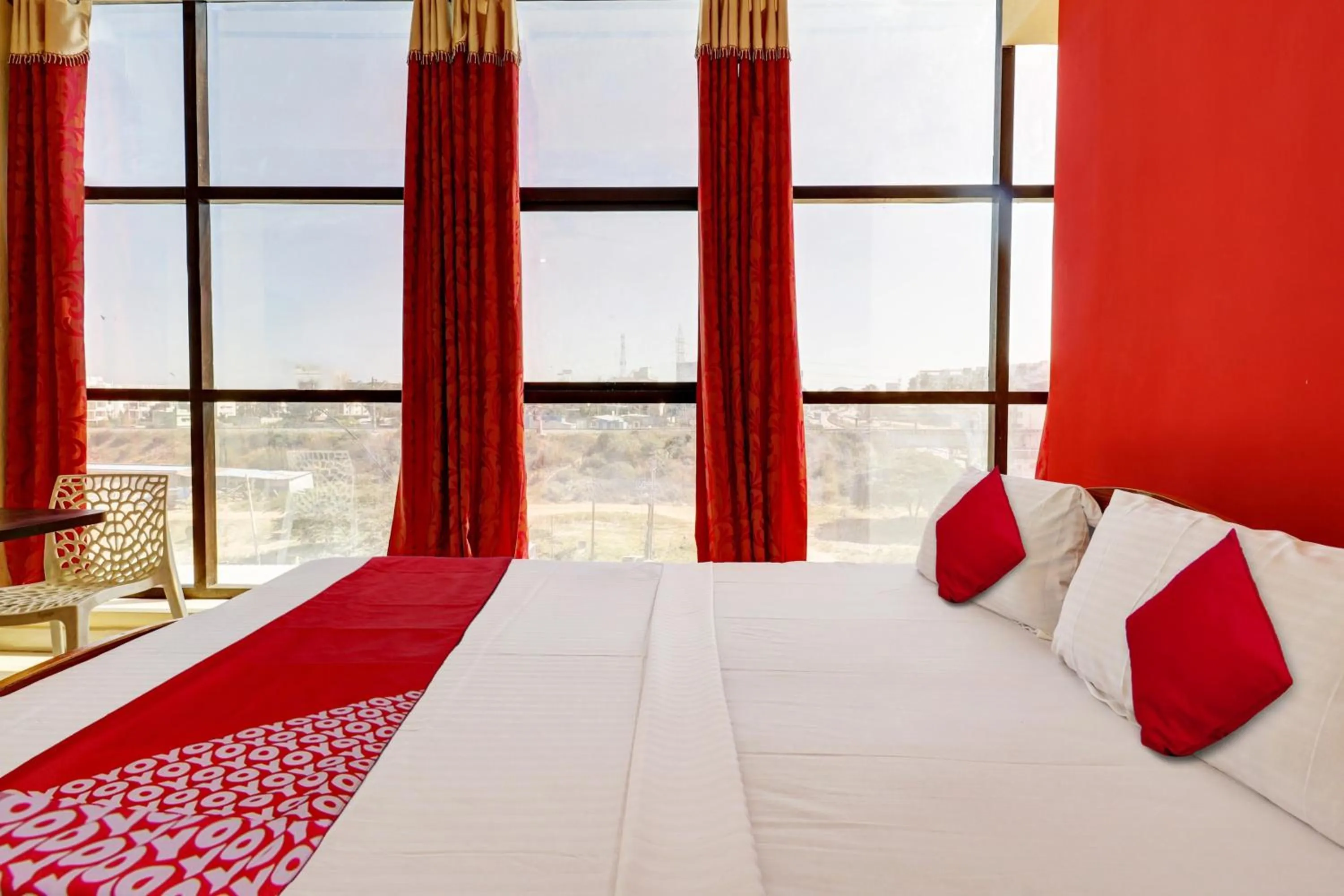 Bedroom in Hotel O S.L.V Boarding & Lodging