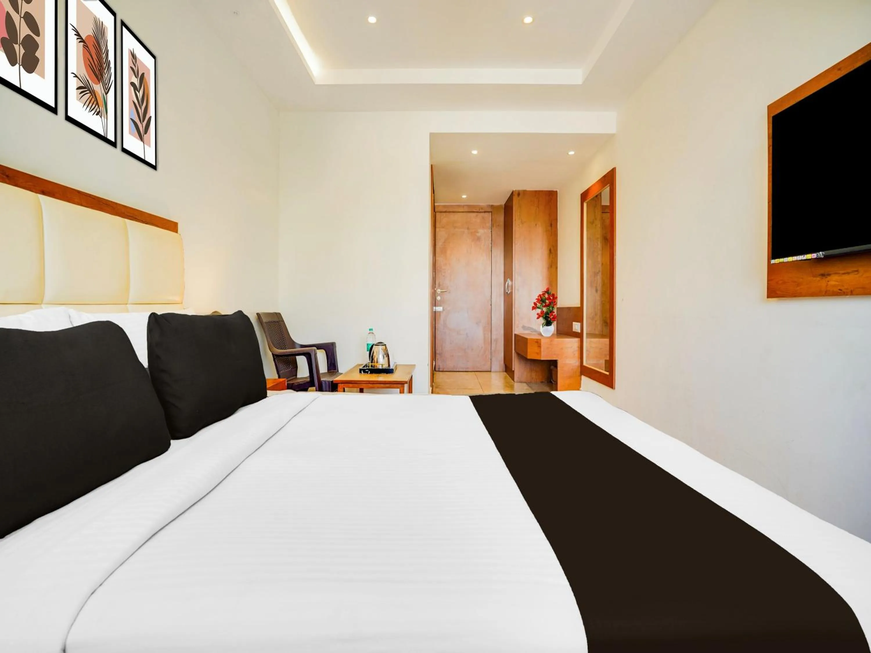 Bedroom, Bed in Super Townhouse Ramamurthy Nagar West Formerly Phoenix Hotel