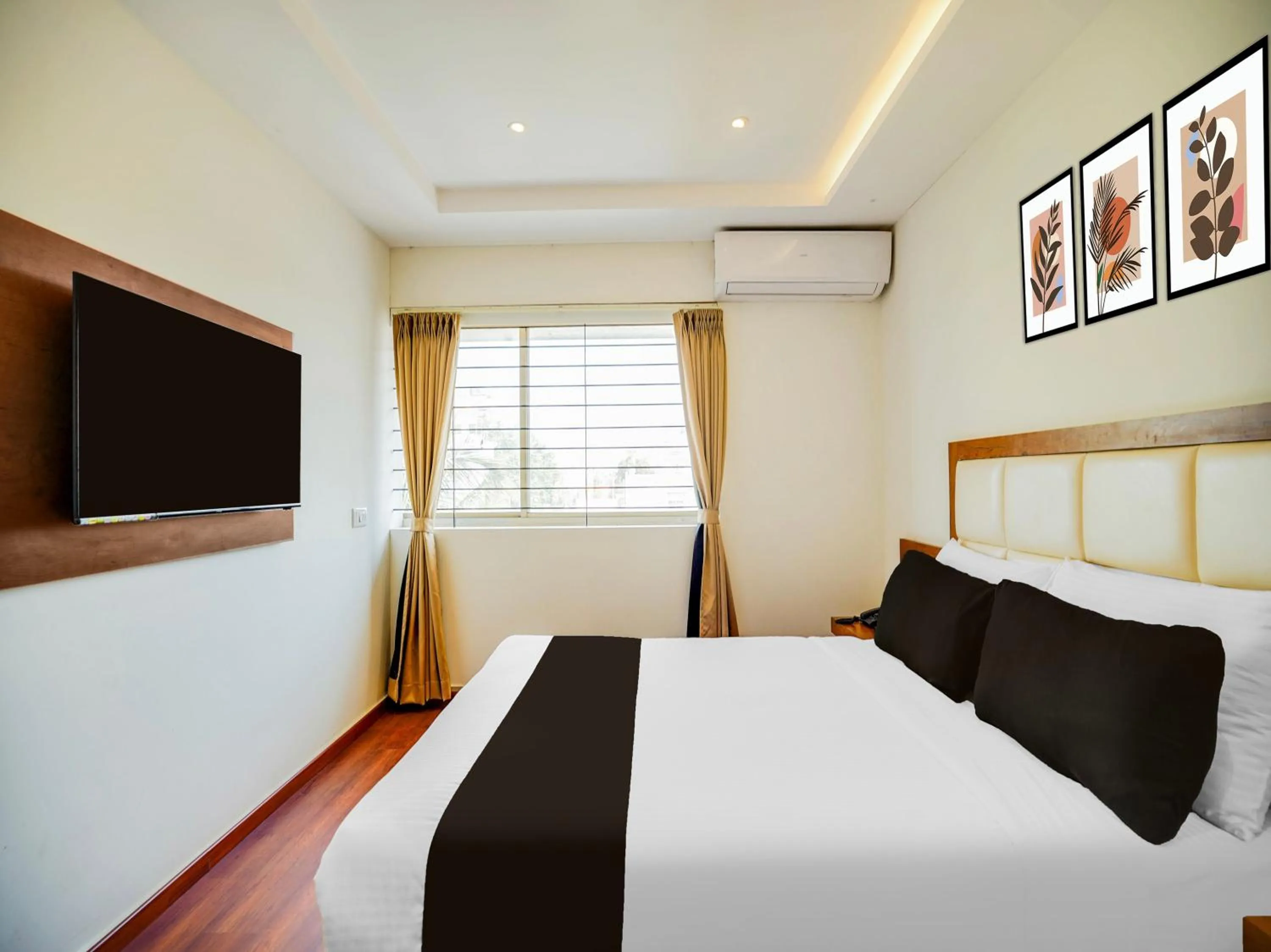 Bedroom, Bed in Super Townhouse Ramamurthy Nagar West Formerly Phoenix Hotel