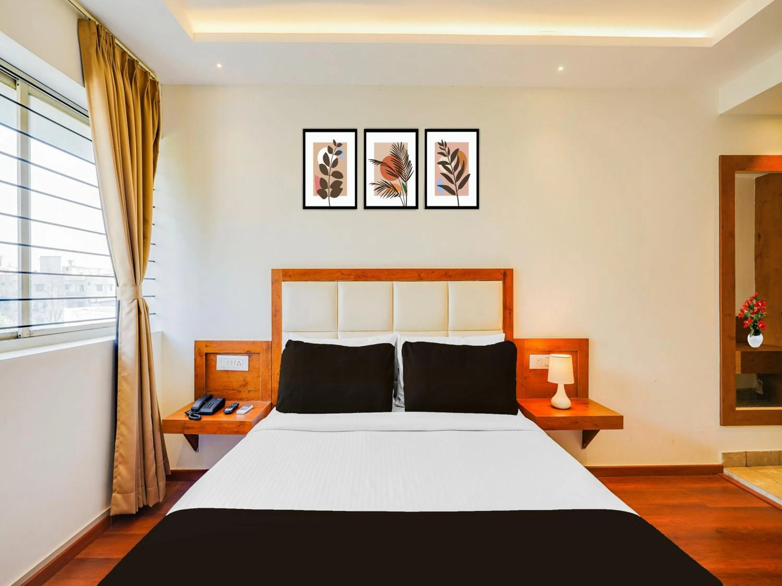 Bedroom, Bed in Super Townhouse Ramamurthy Nagar West Formerly Phoenix Hotel