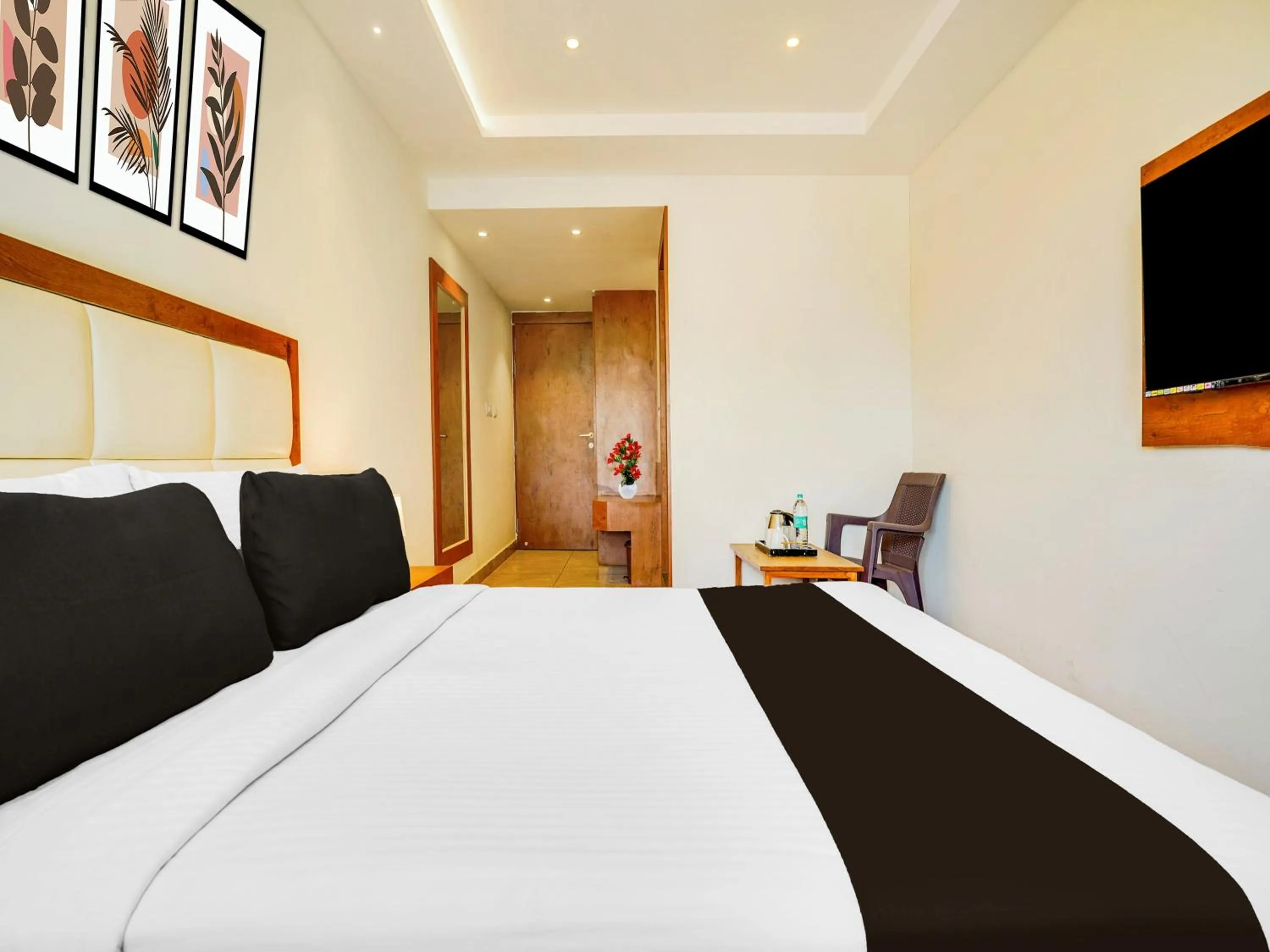 Bedroom, Bed in Super Townhouse Ramamurthy Nagar West Formerly Phoenix Hotel