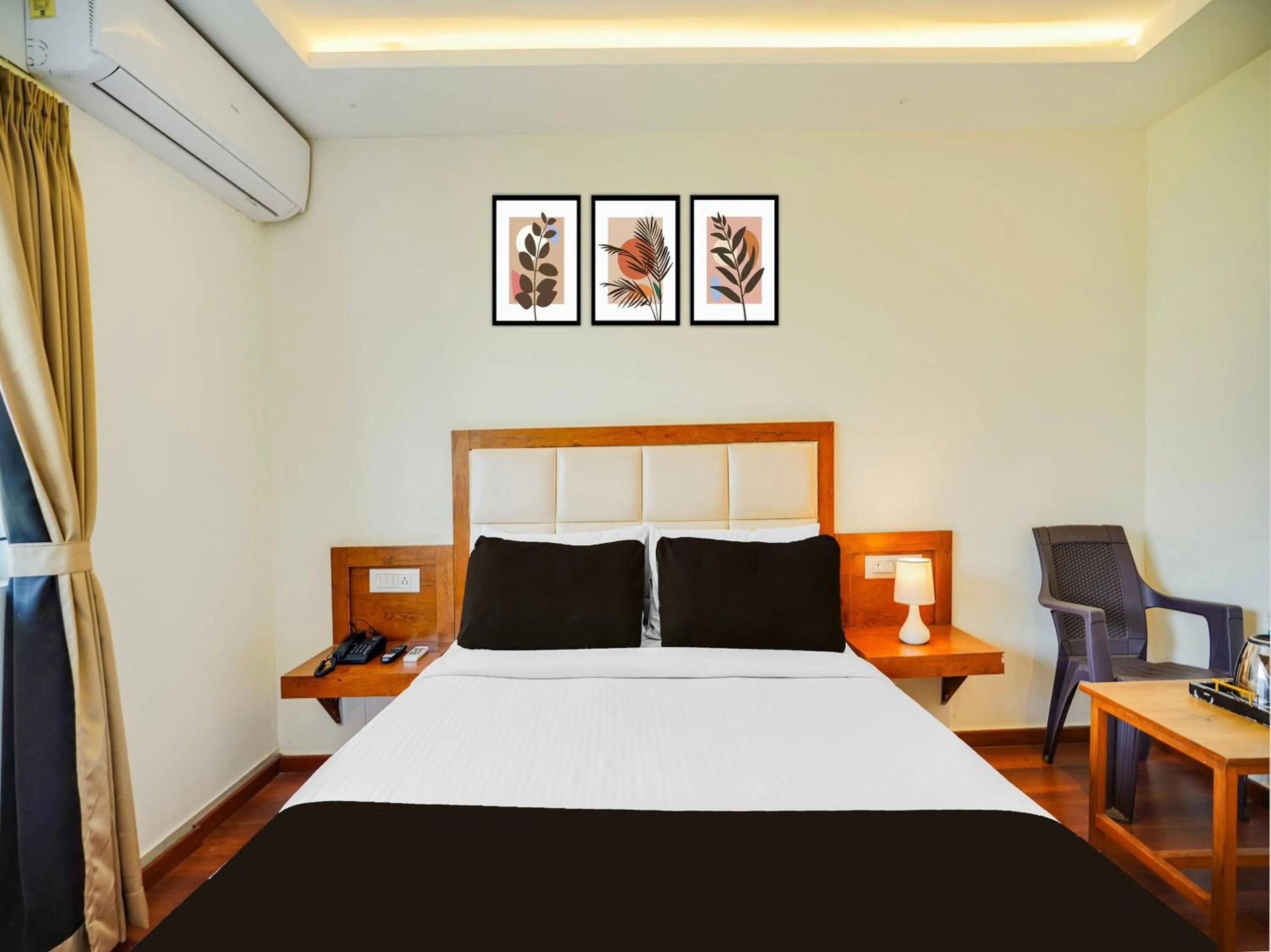 Bedroom, Bed in Super Townhouse Ramamurthy Nagar West Formerly Phoenix Hotel