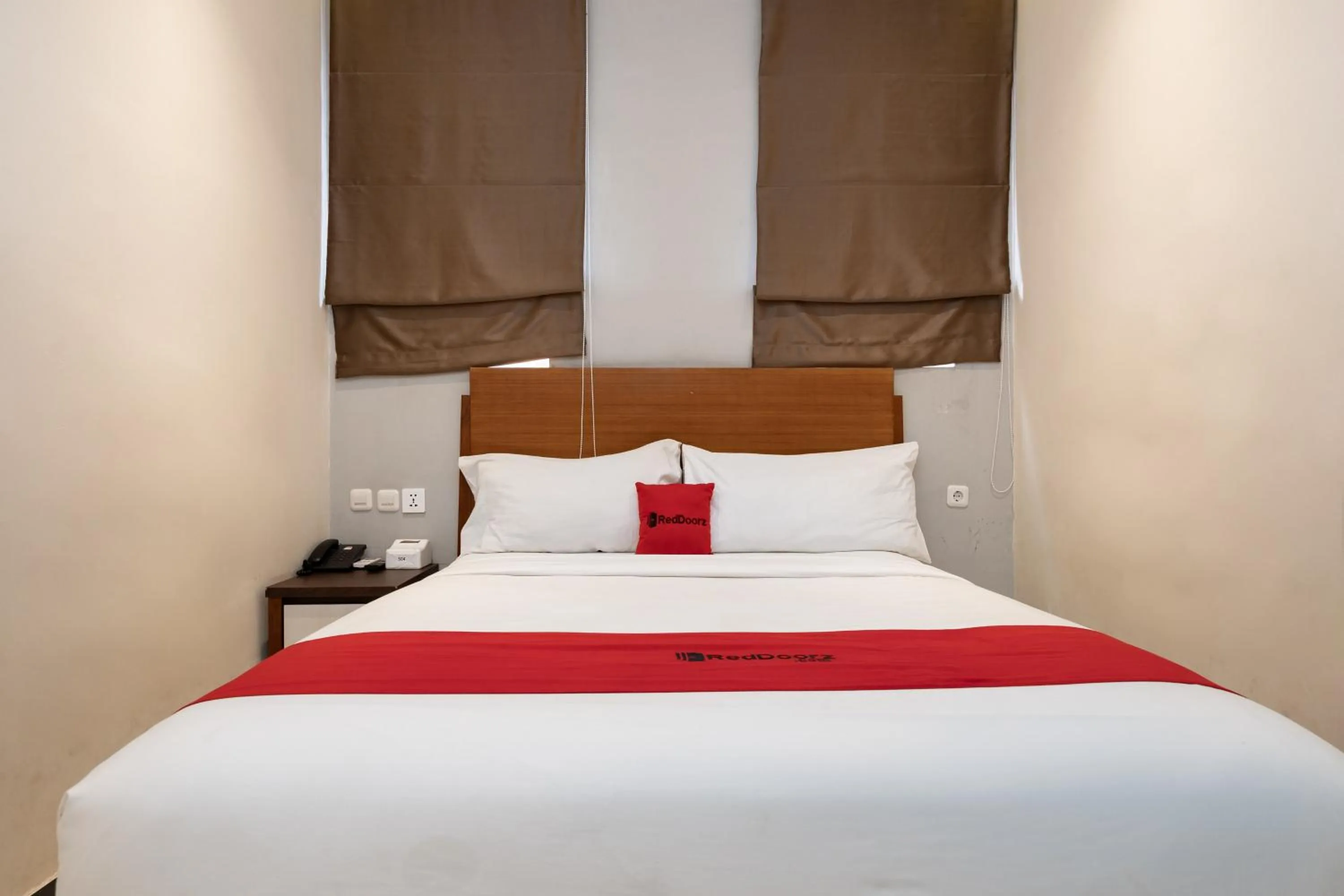 Bedroom, Bed in RedDoorz Plus @ UNO Jalan Merak Samarinda