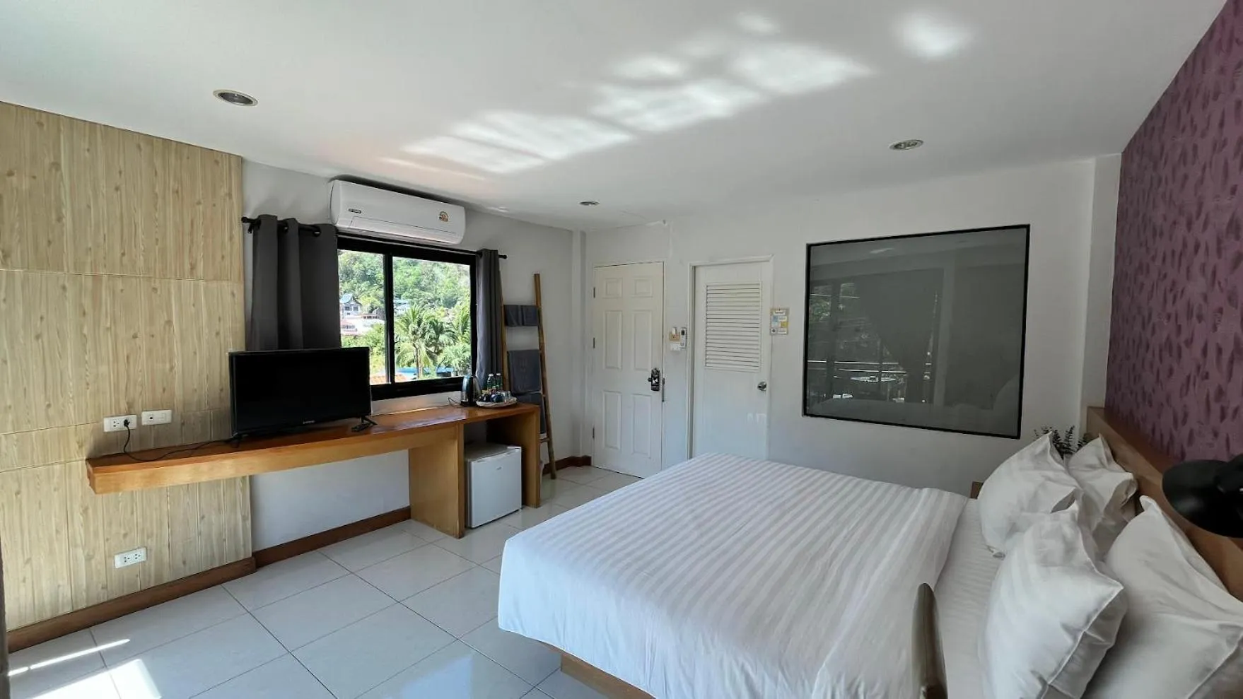 Photo of the whole room, Bed in Coco Mountain View Guest House Hotel