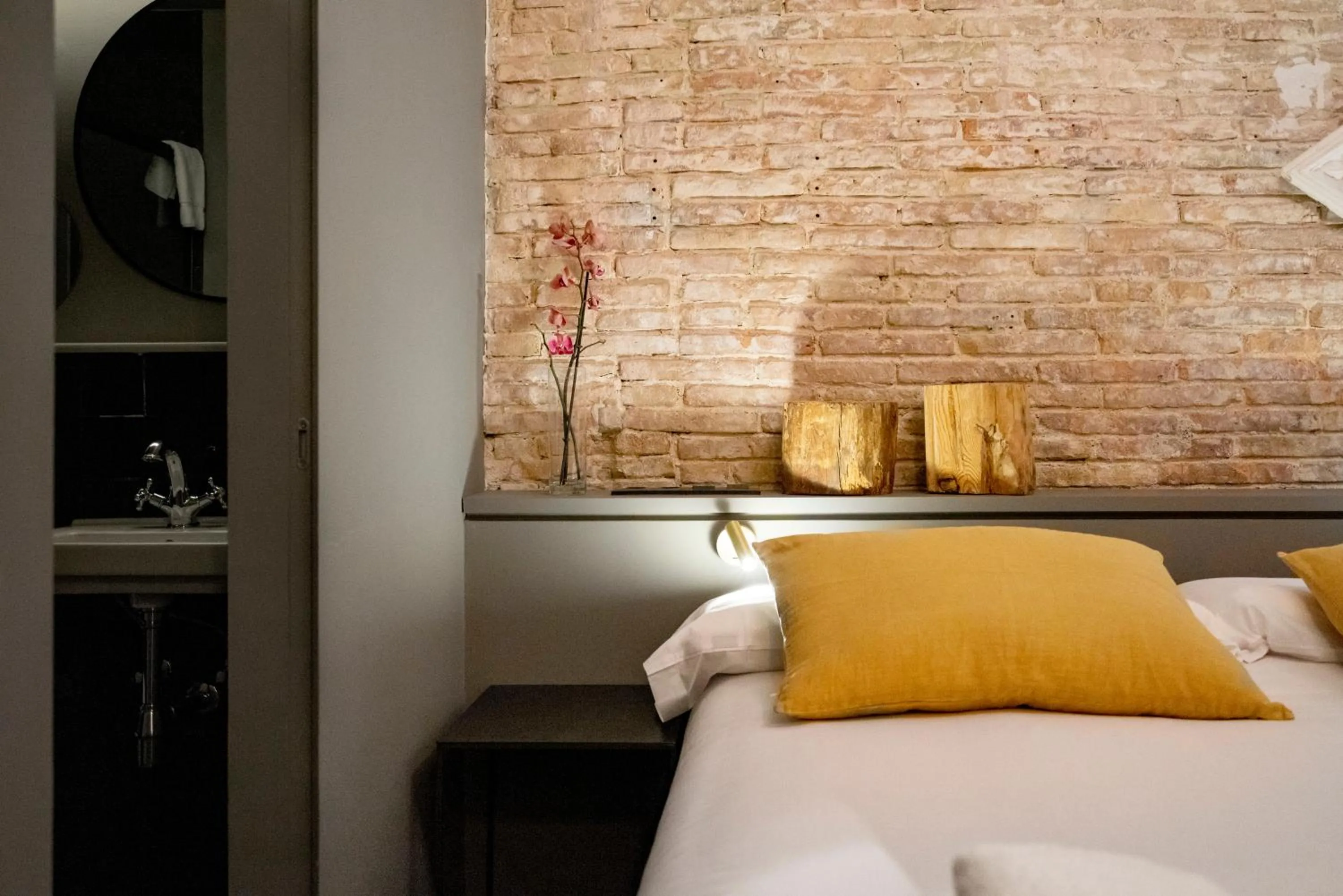 Bed in Hostal Porxos Garden
