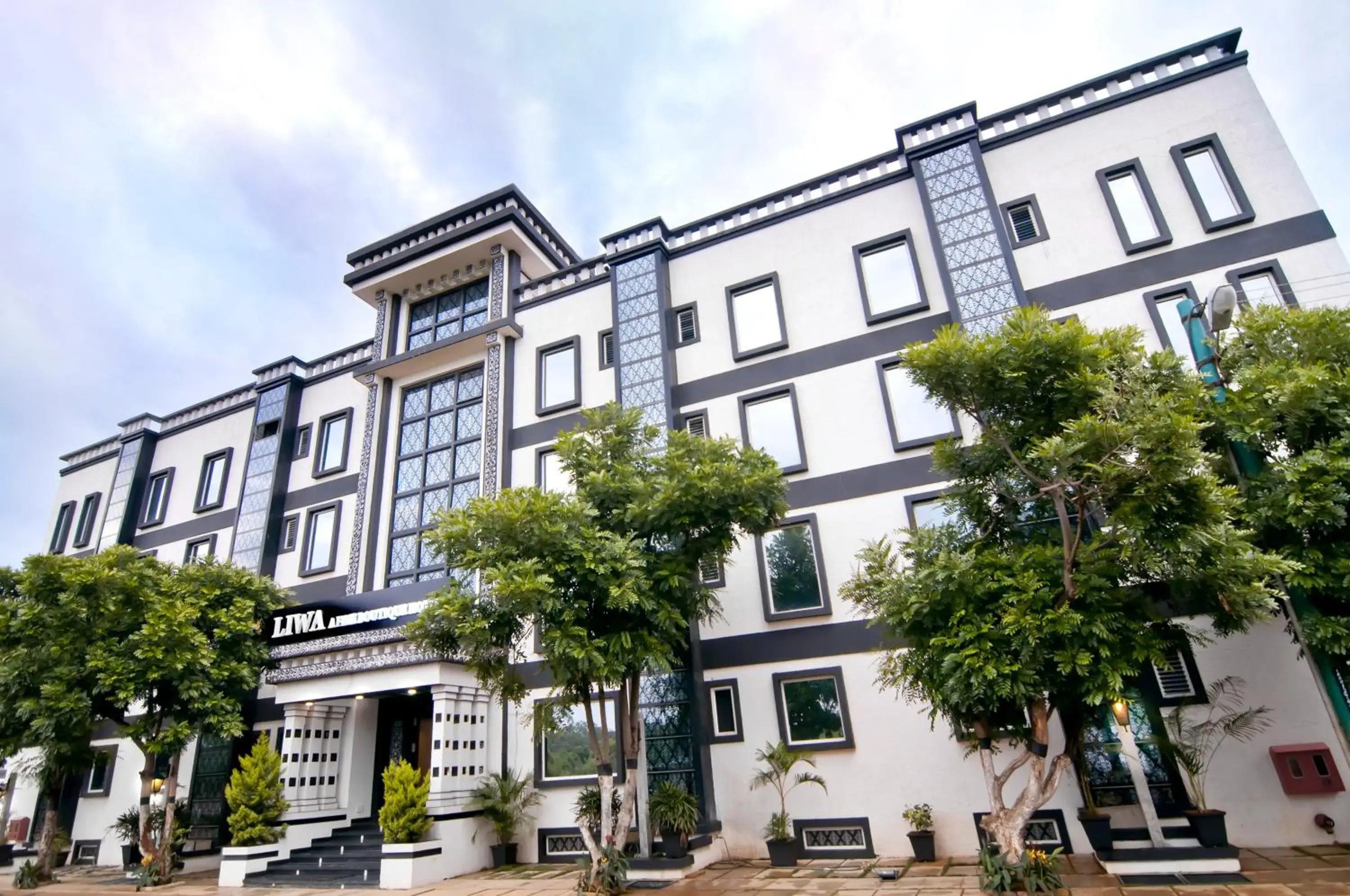 Property building in Liwa - The Transit Hotel, Bengaluru Property building in Liwa - The Transit Hotel, Bengaluru