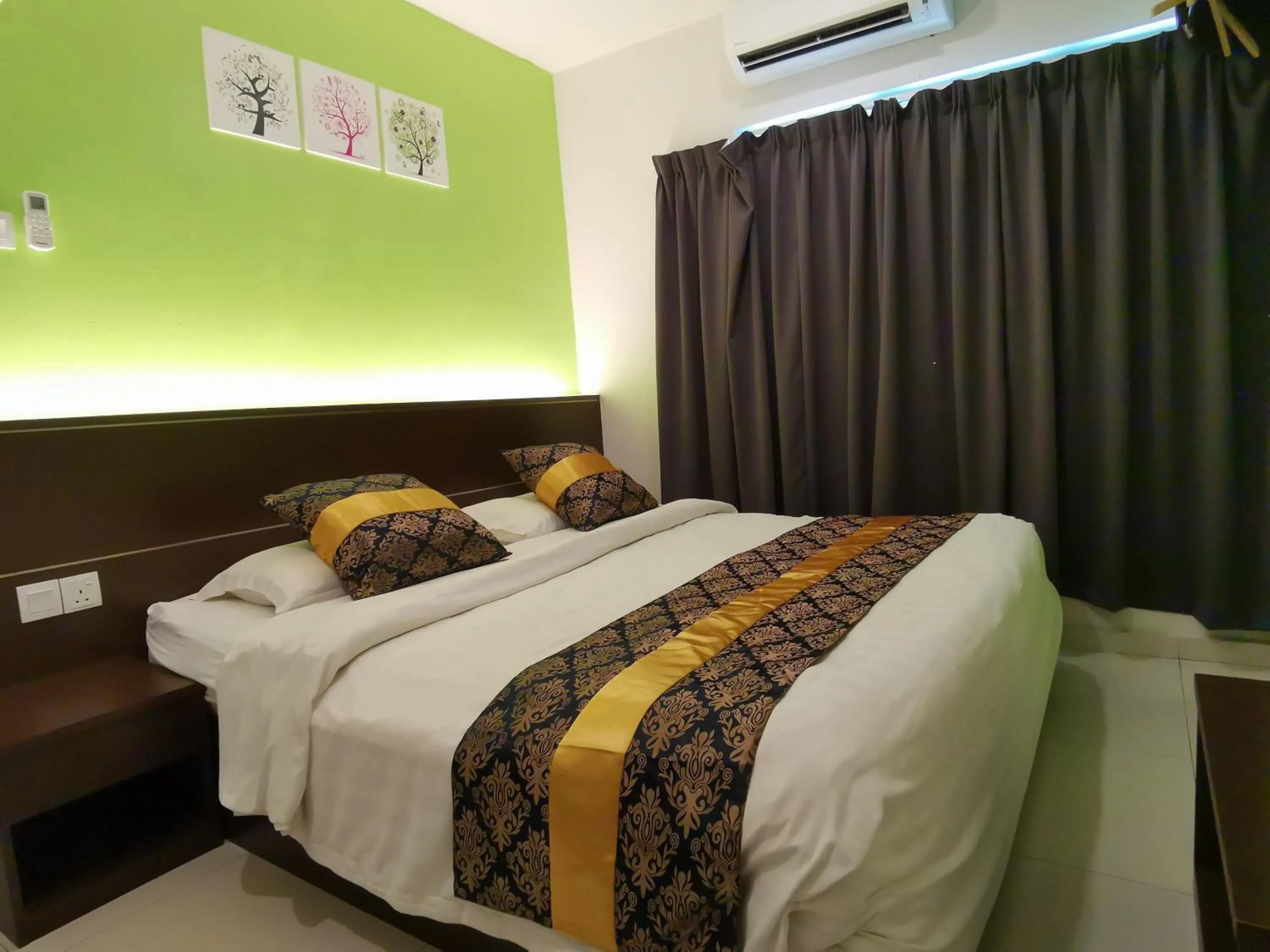 Bed in Star Bay Hotel