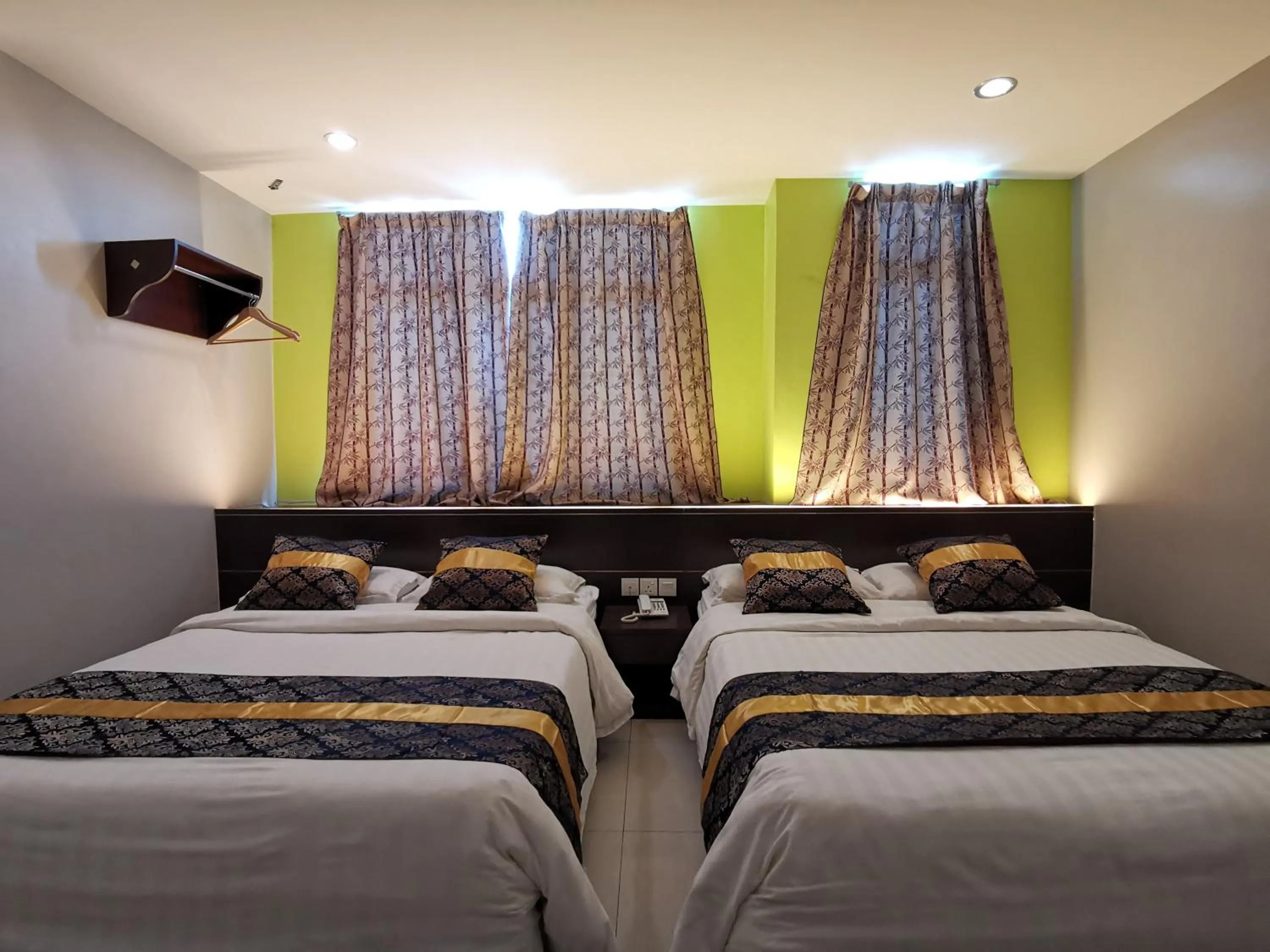 Bed in Star Bay Hotel