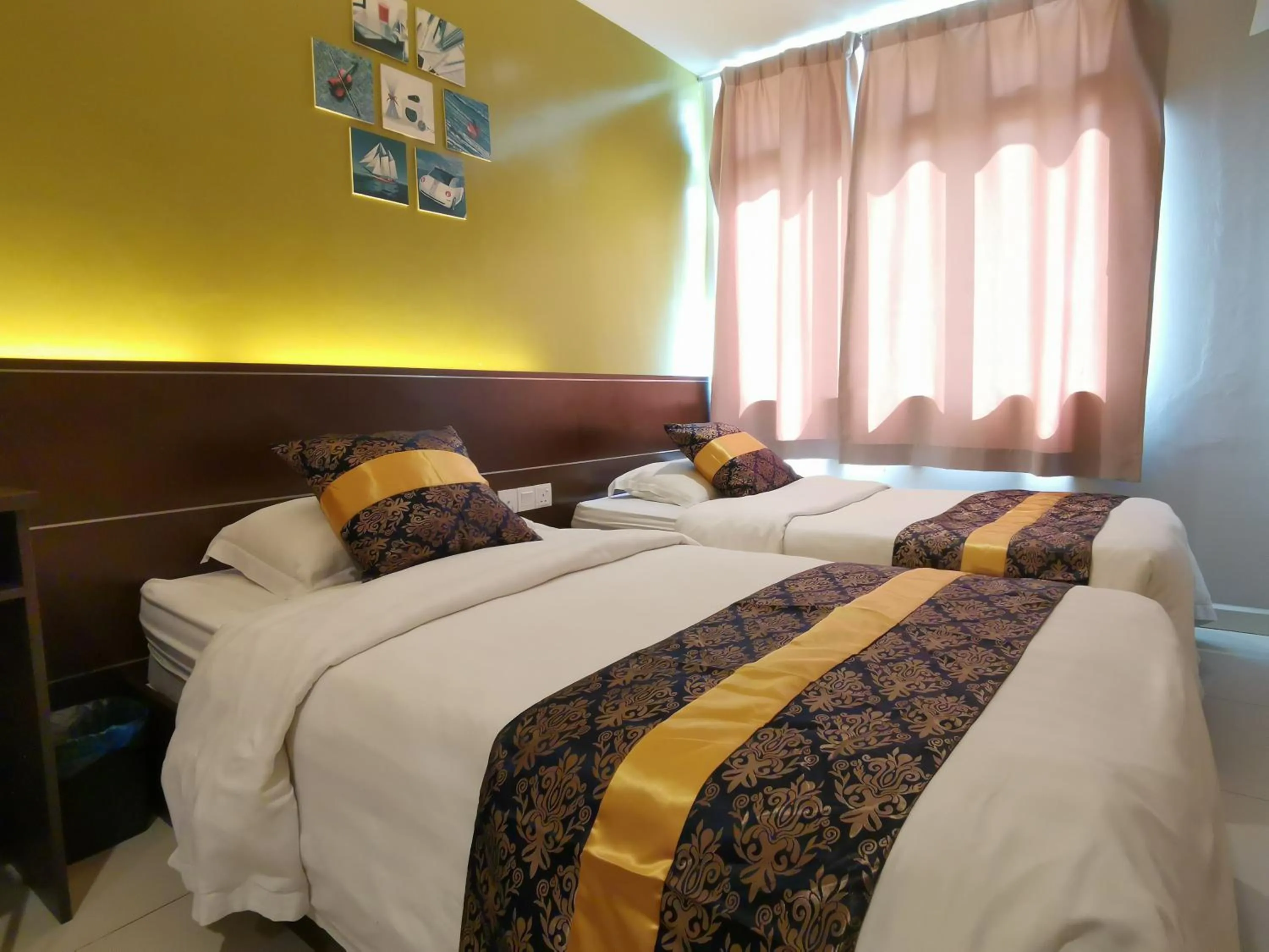 Bed in Star Bay Hotel