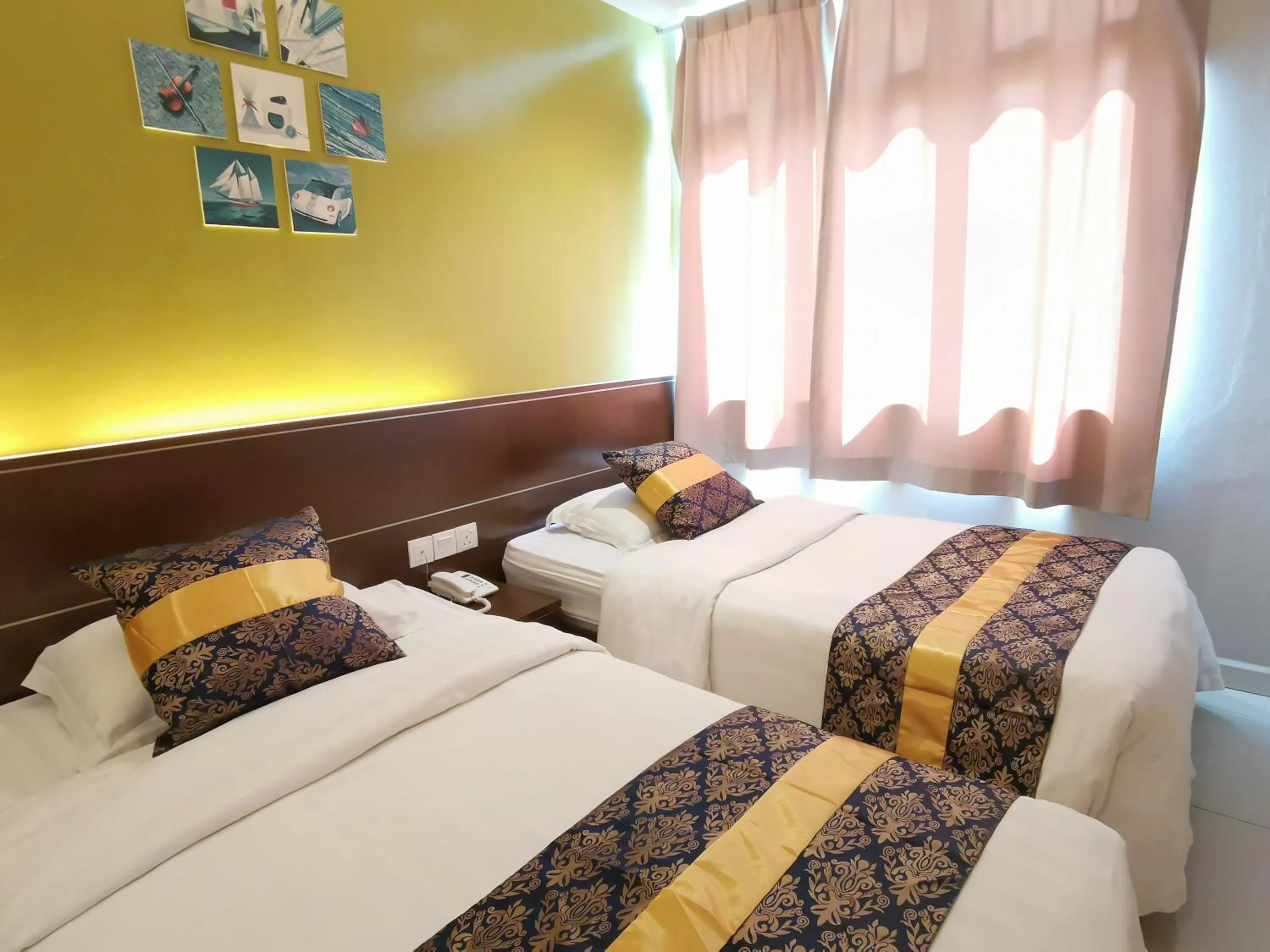 Bed in Star Bay Hotel