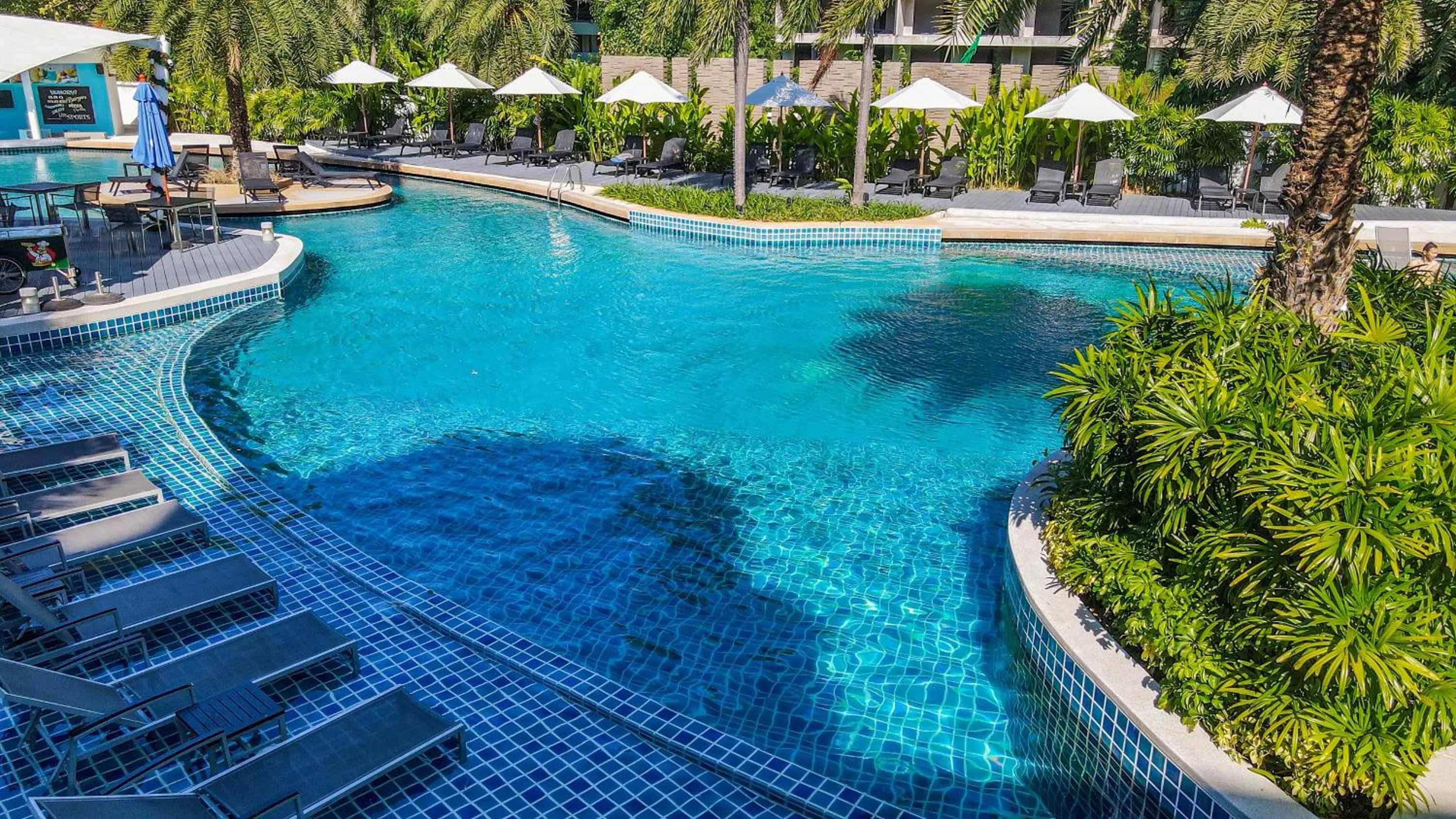 Swimming pool in Holiday Inn Resort Phuket Karon Beach by IHG