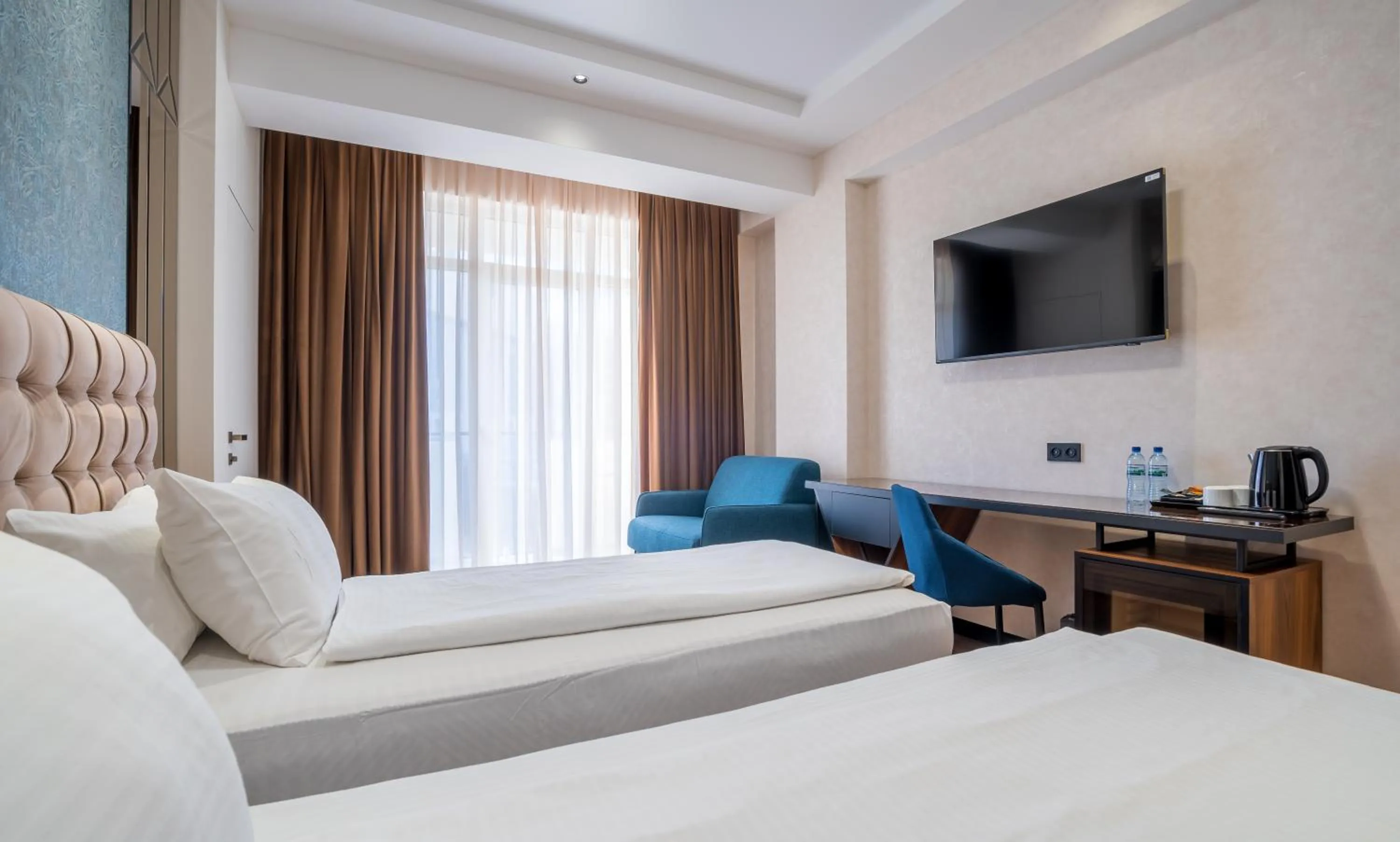 Coffee/tea facilities, Bed in Olympus Hotel By Umbrella