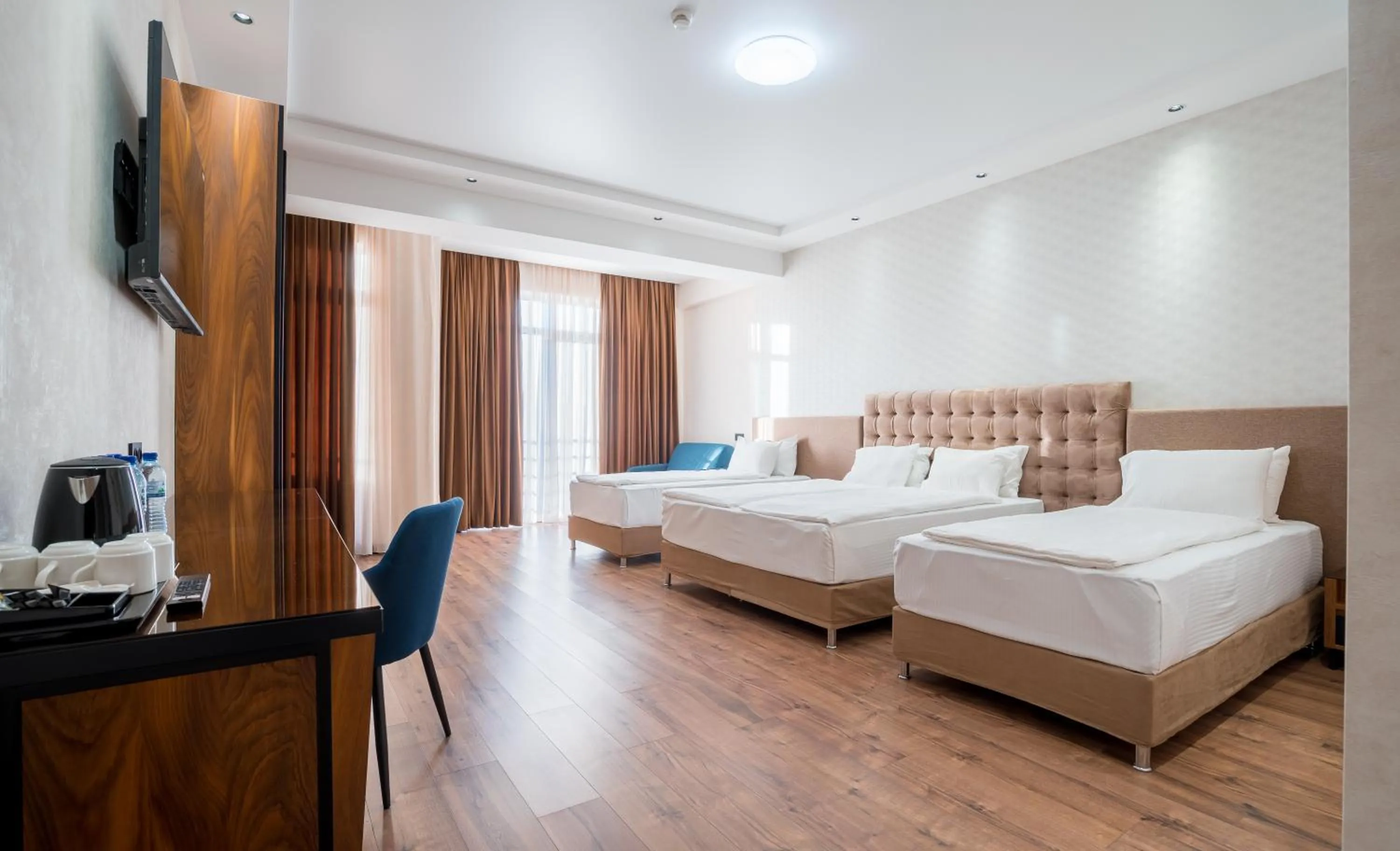 Bed in Olympus Hotel By Umbrella