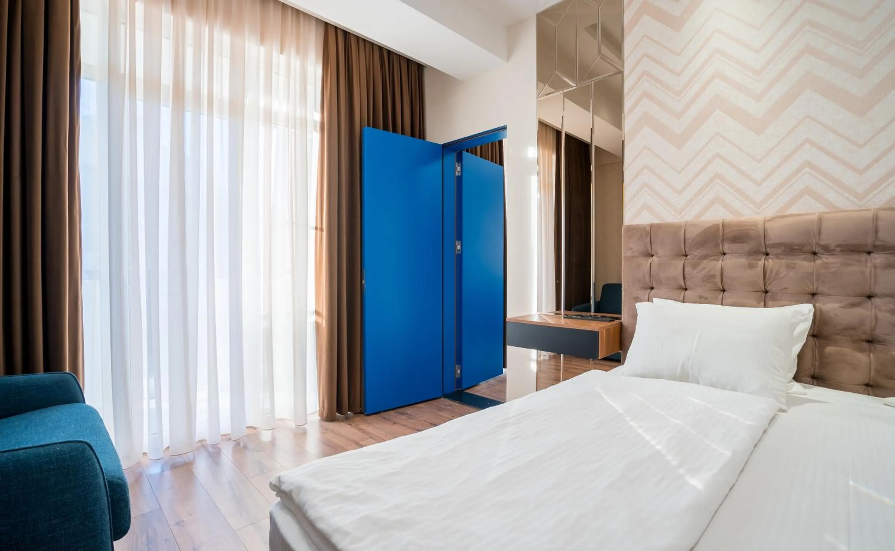 Photo of the whole room, Bed in Olympus Hotel By Umbrella