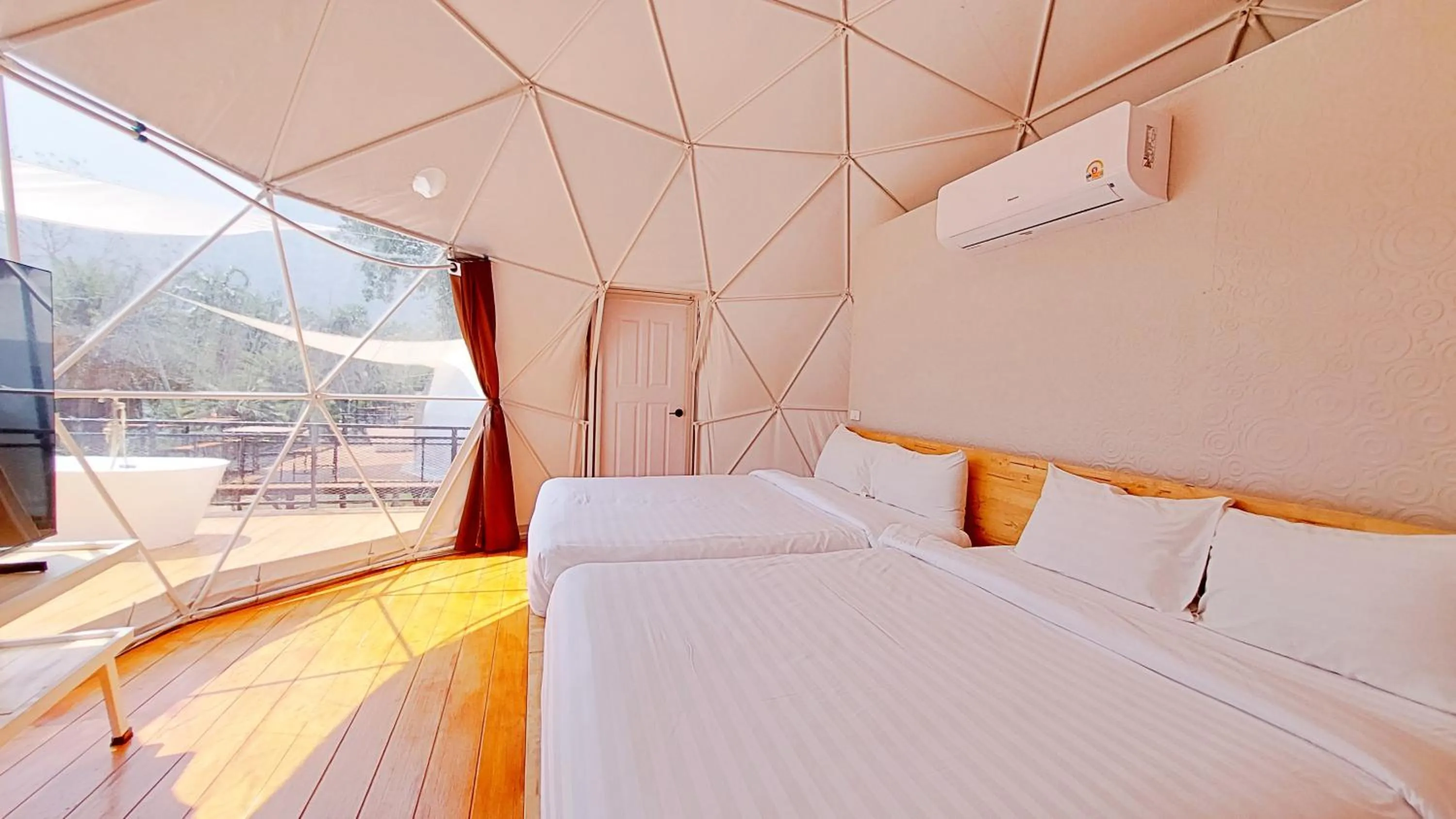 Bed in Puprai Tarnnarm Resort