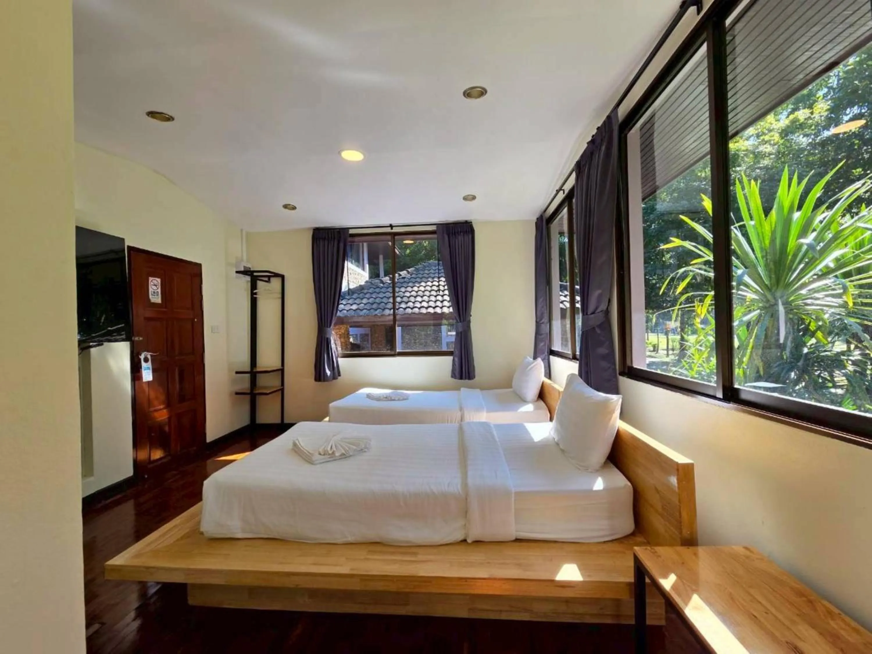 Photo of the whole room, Bed in Puprai Tarnnarm Resort