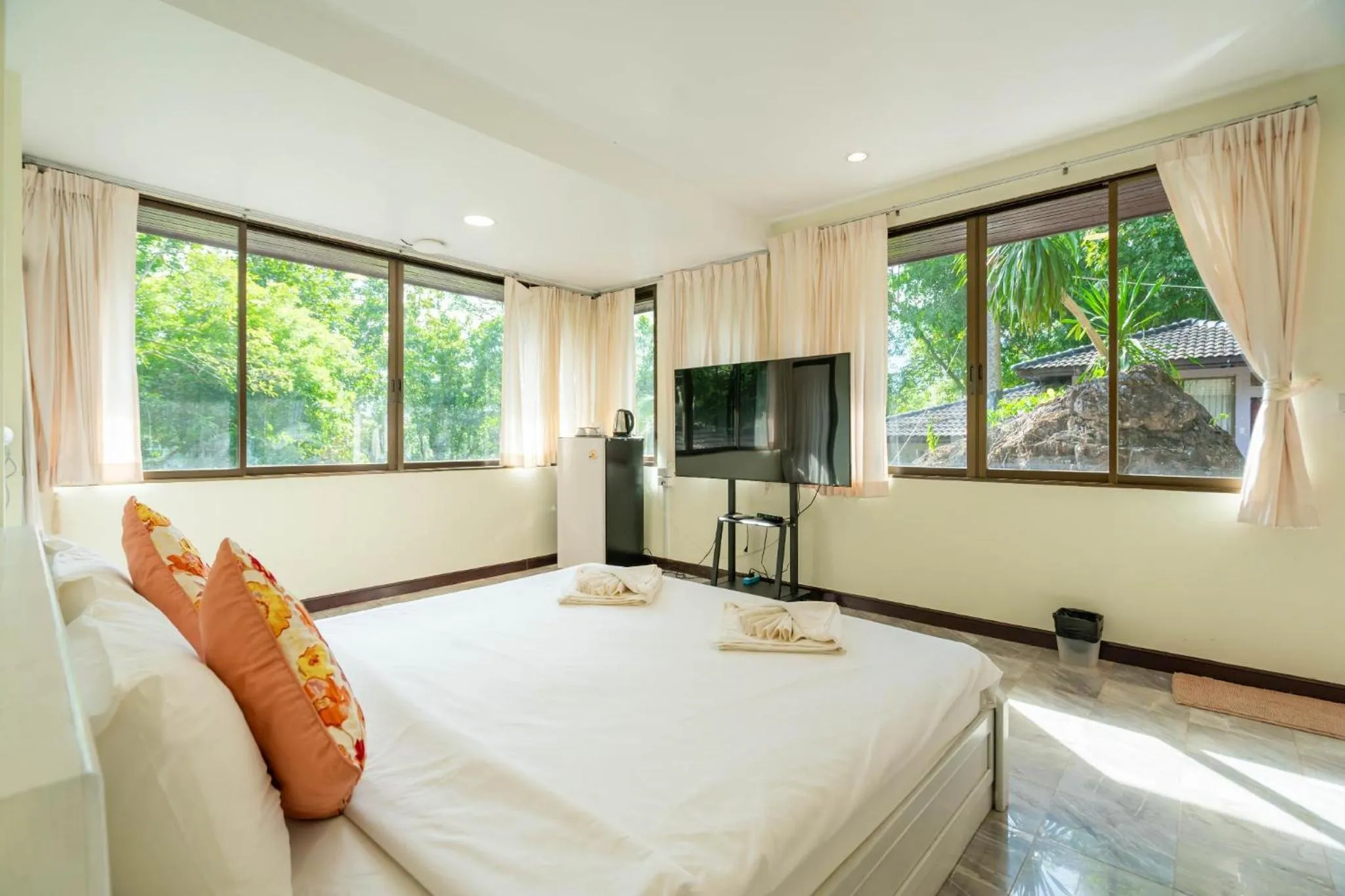 Bed in Puprai Tarnnarm Resort