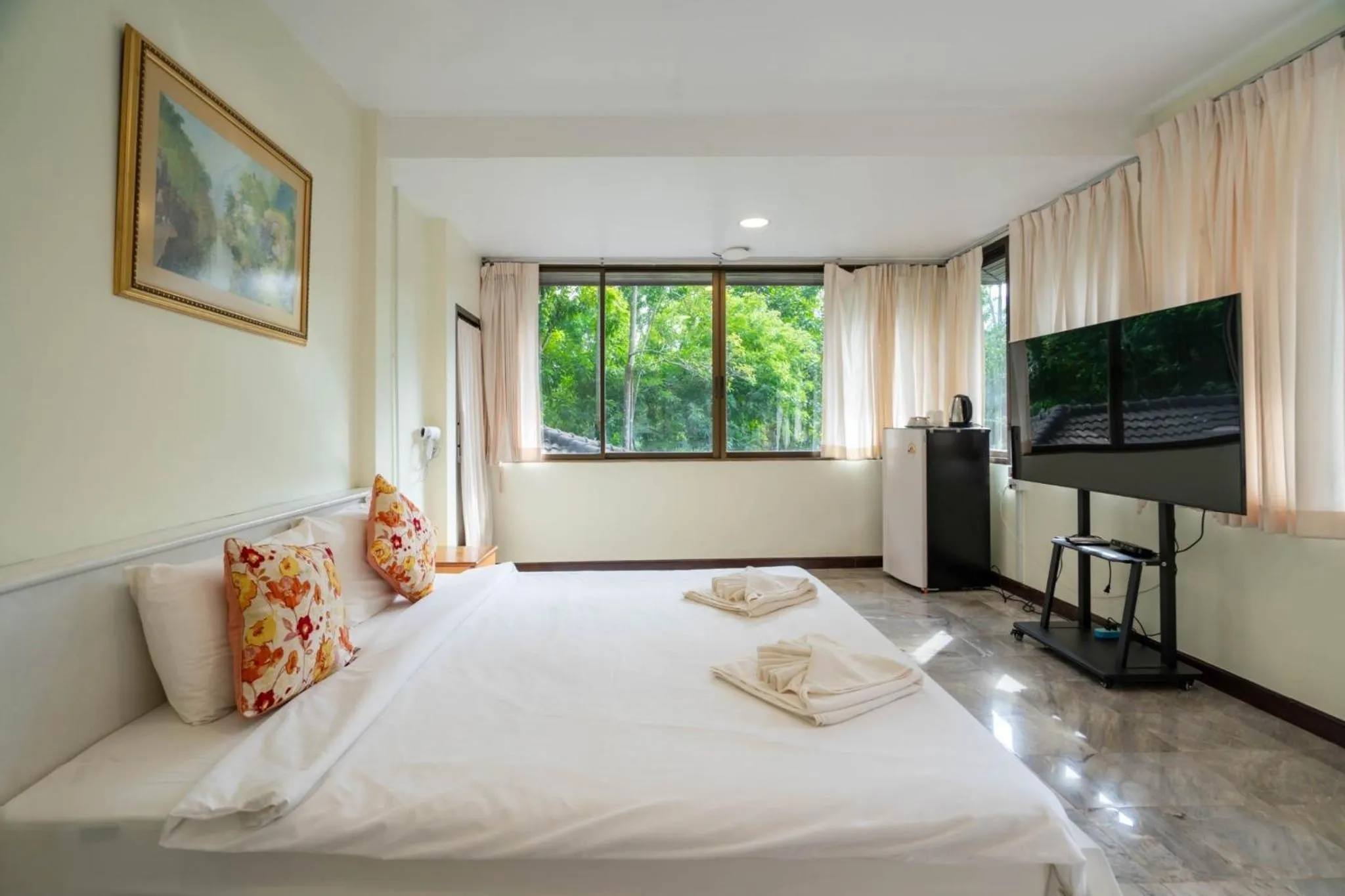 Bed in Puprai Tarnnarm Resort