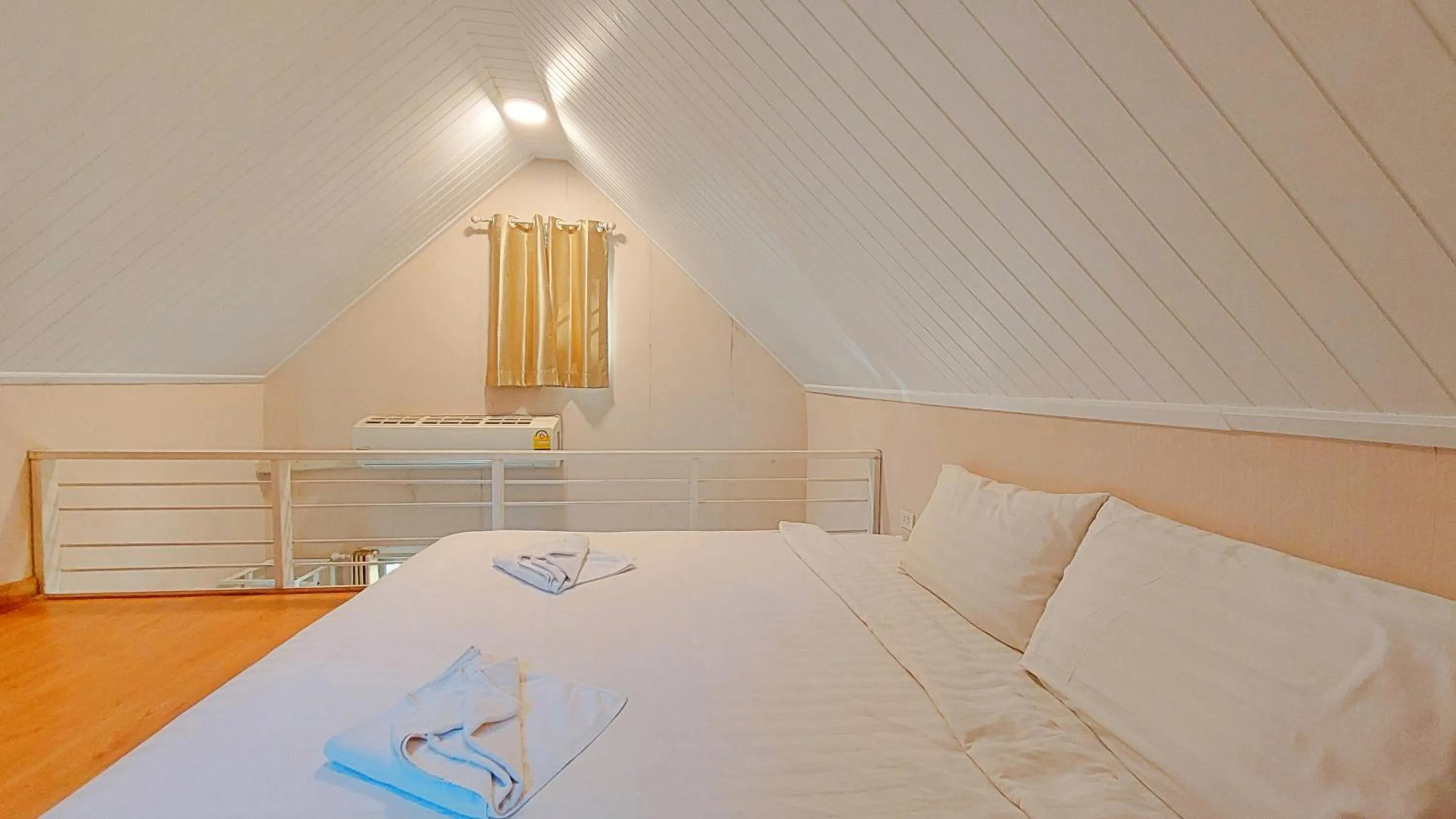 Bed in Puprai Tarnnarm Resort