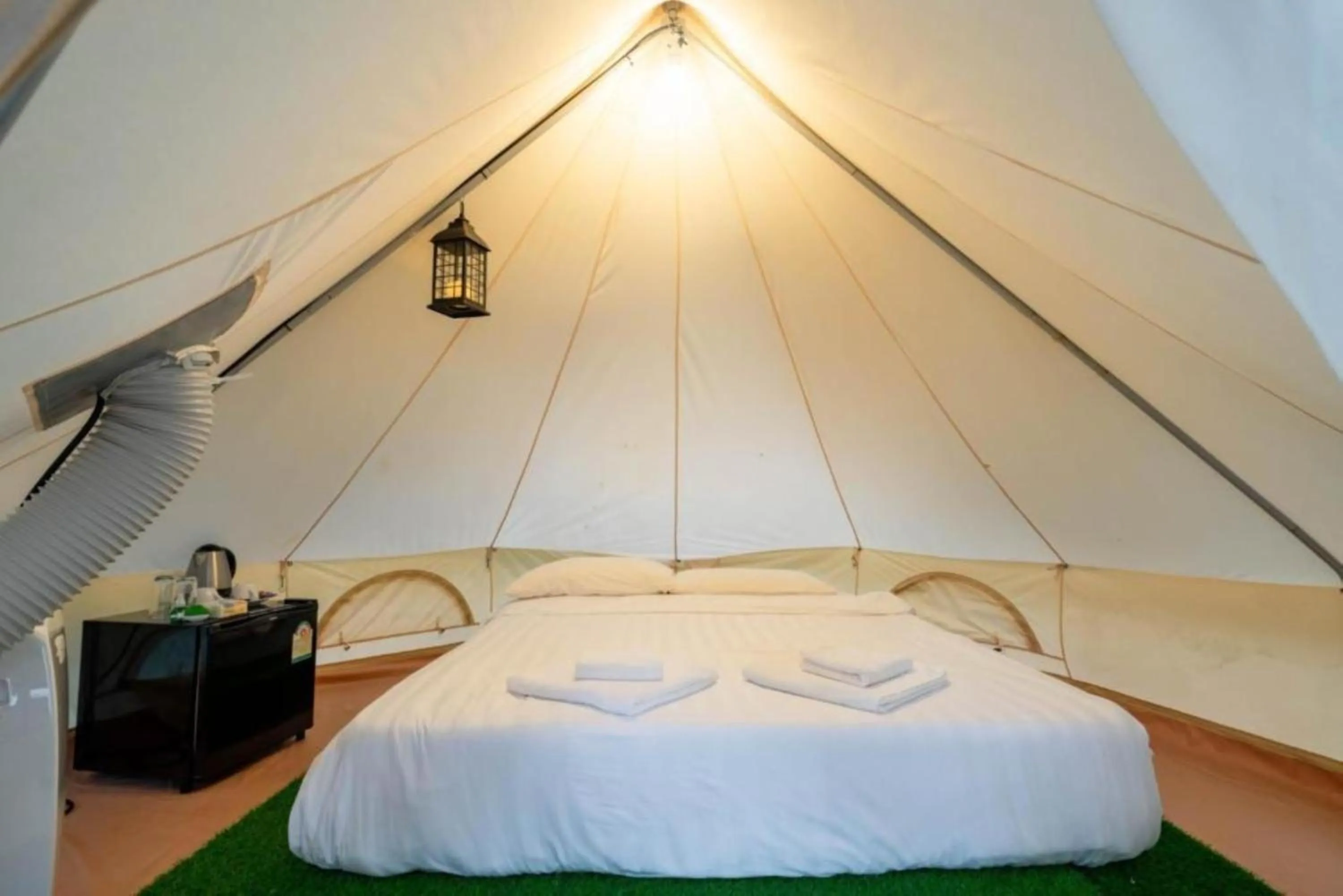 Bed in Puprai Tarnnarm Resort