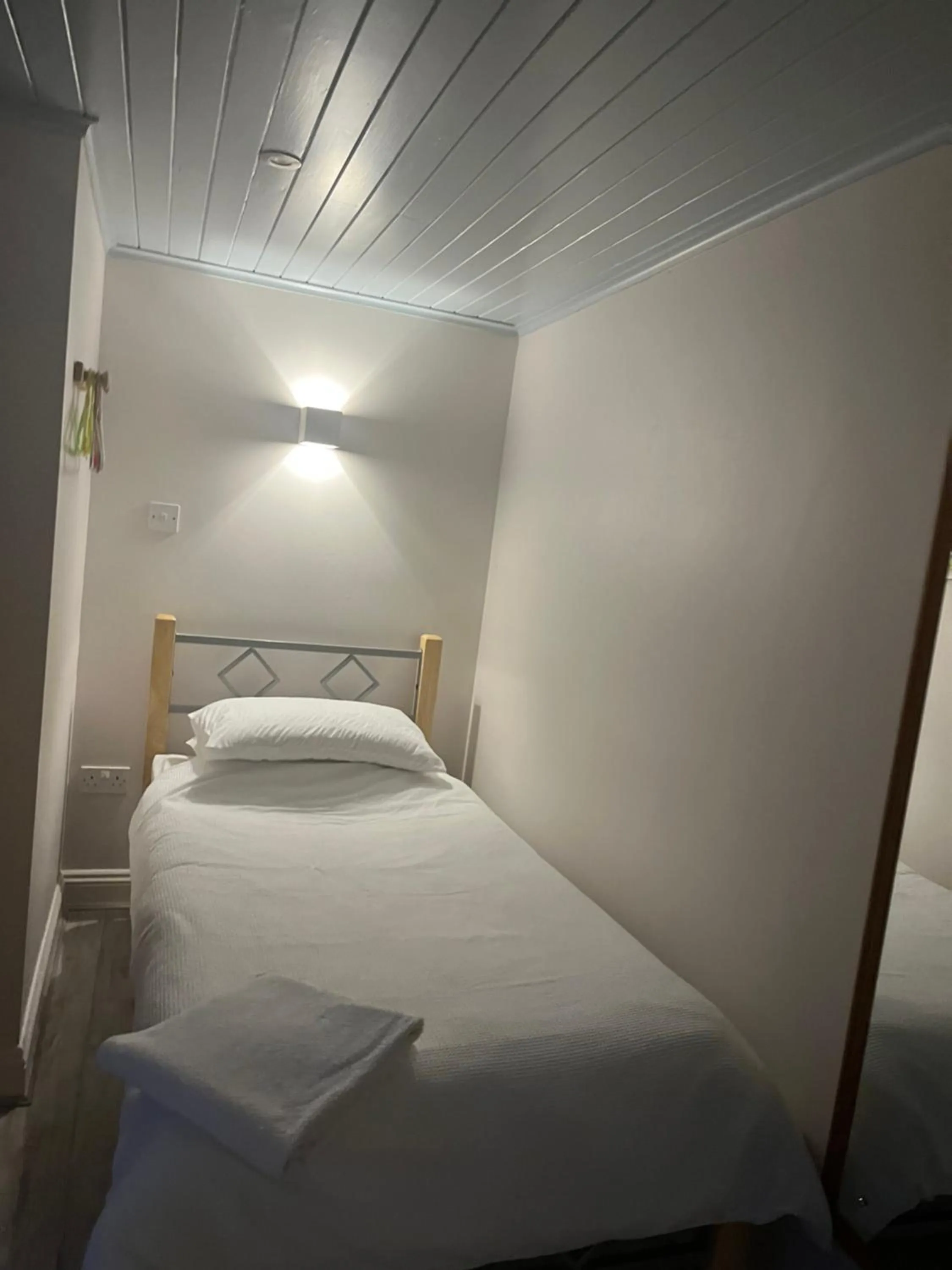 Bed in Ferry House Holidays