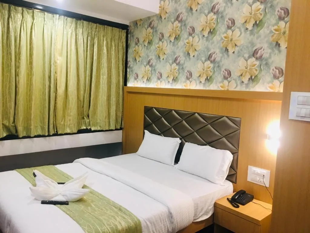 Bed in AR By Glitz Hotels