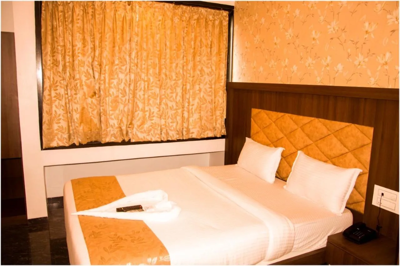 Bed in AR By Glitz Hotels