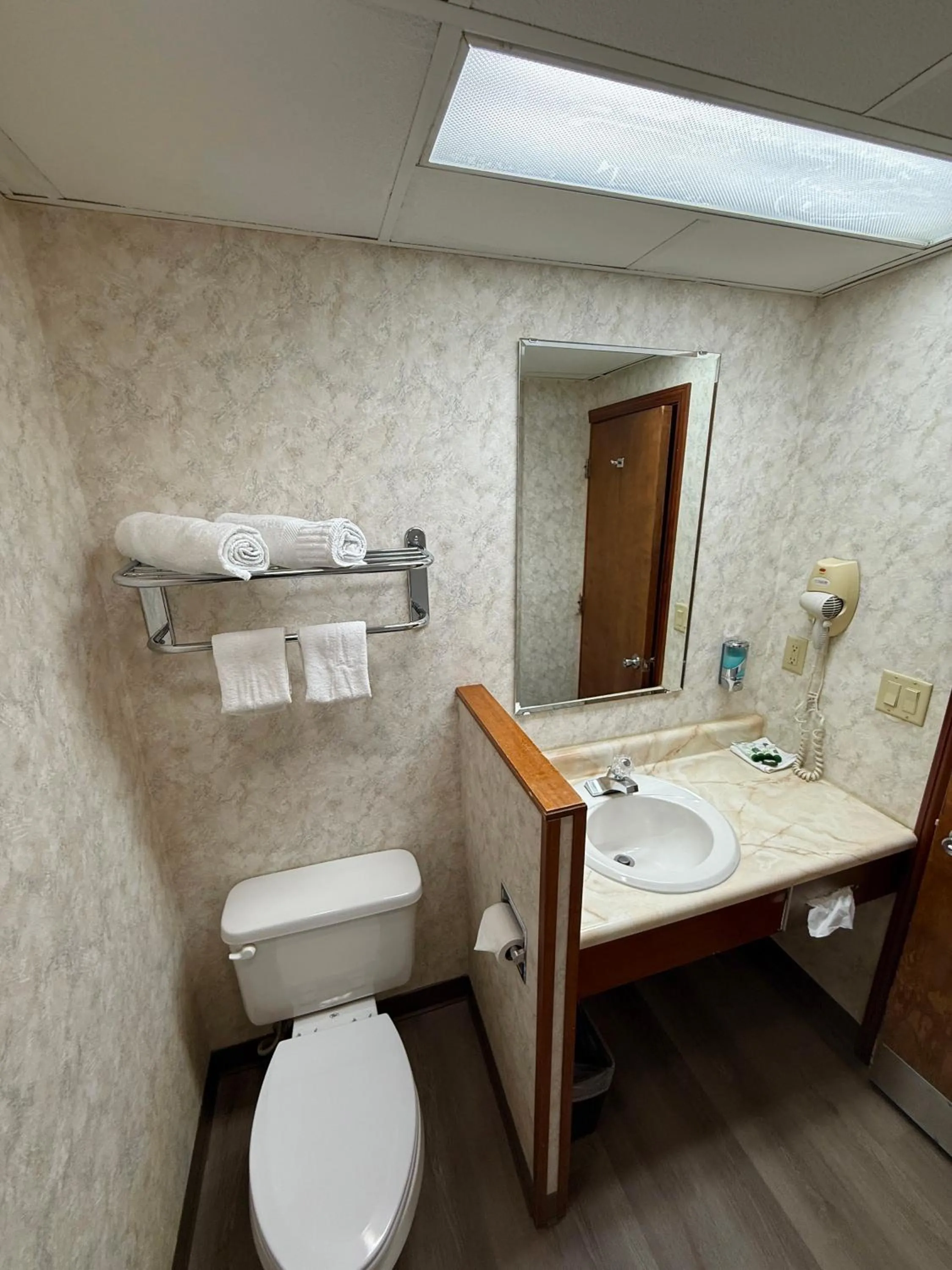 Toilet in Presque Isle Hotel