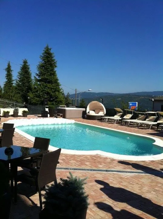 Swimming pool in Albergo Ristorante Miramonti Toano
