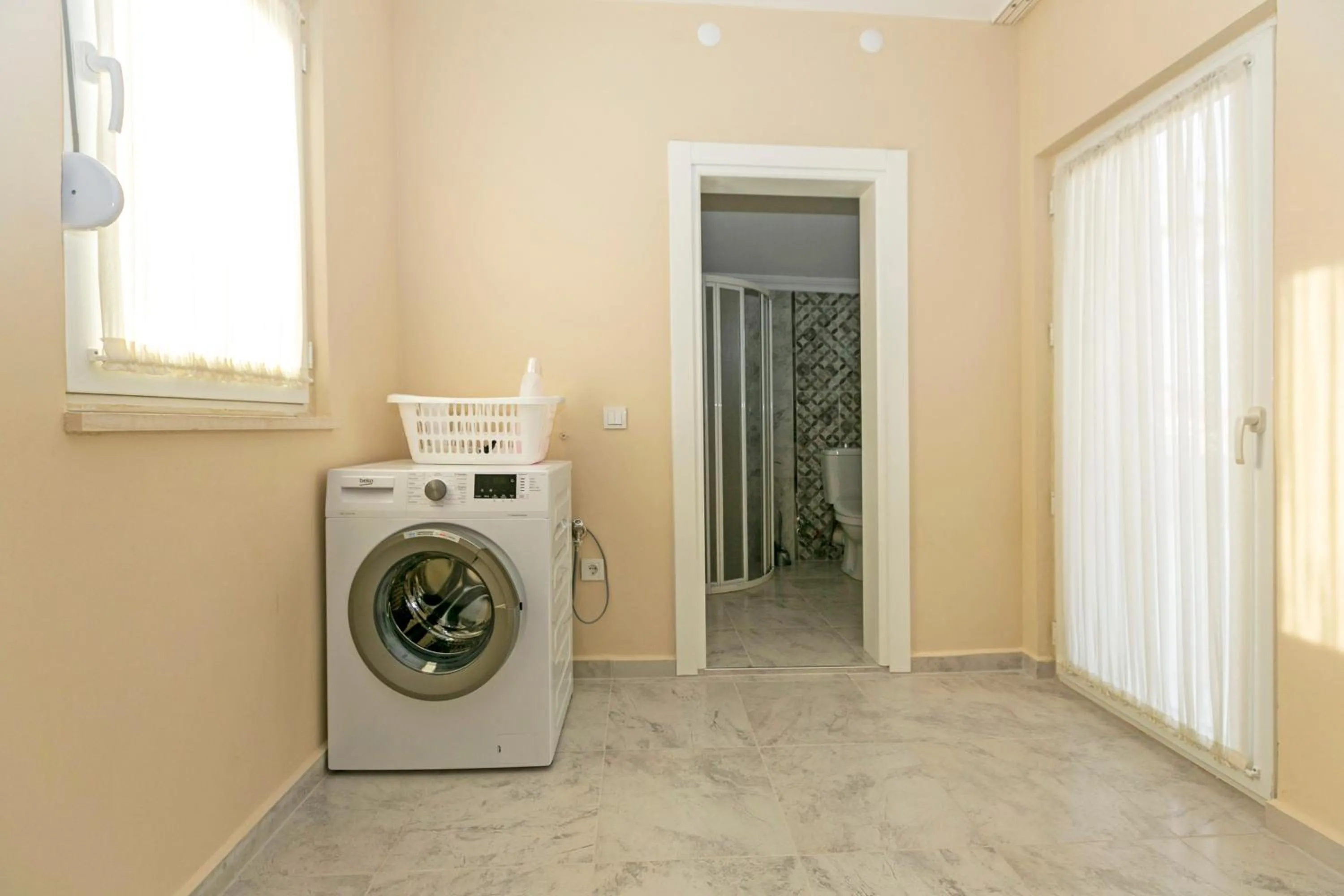 washing machine in Paradise Town Villa Legend
