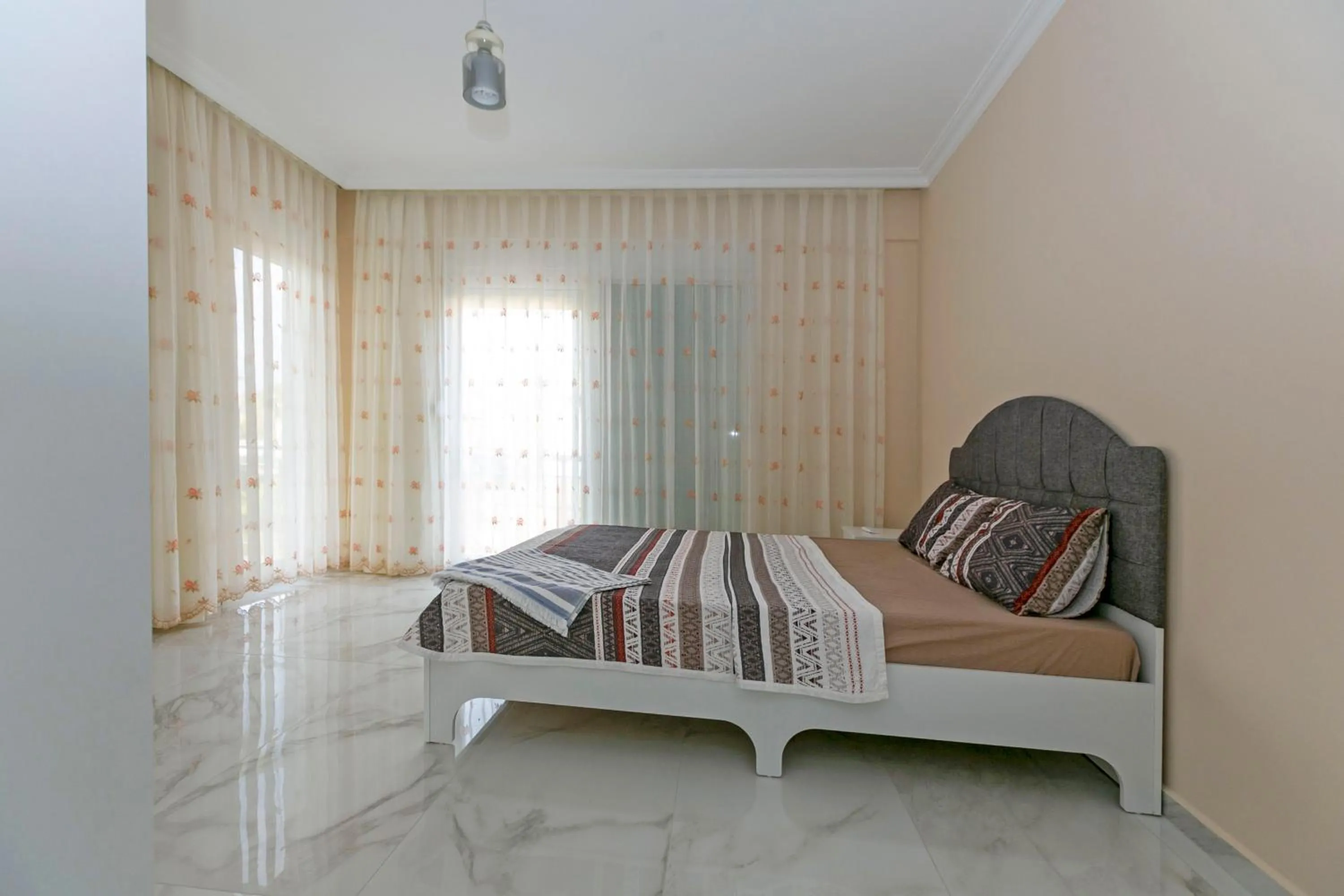 Bed in Paradise Town Villa Legend