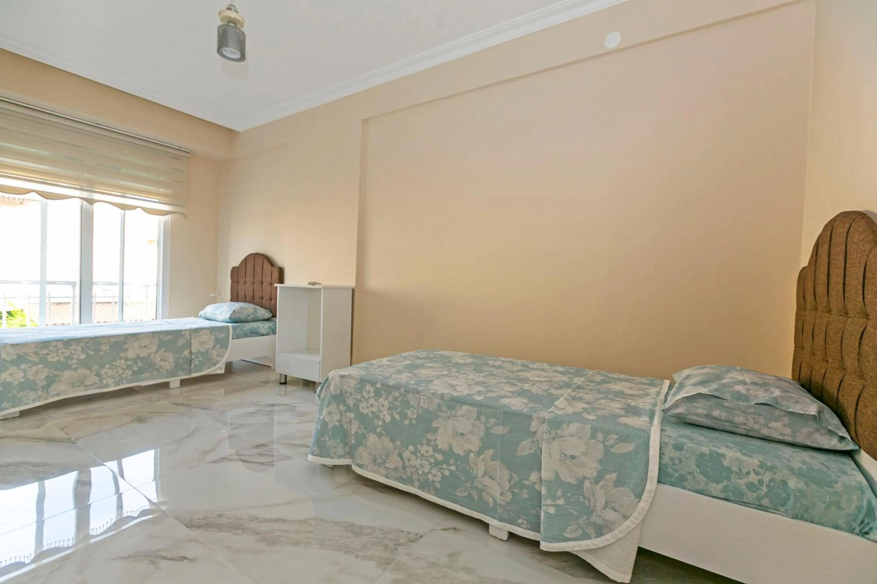 Bed in Paradise Town Villa Legend