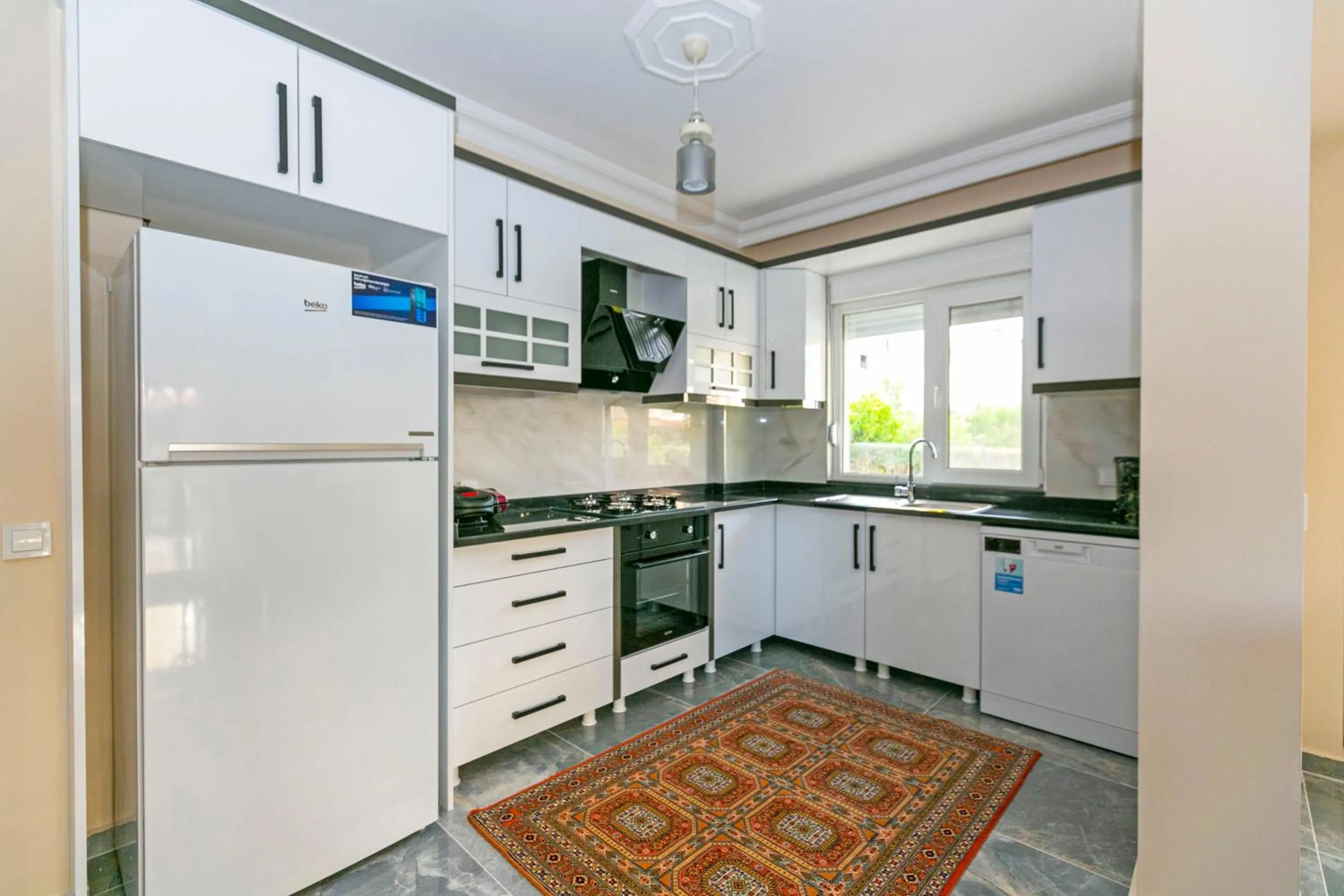 Kitchen or kitchenette in Paradise Town Villa Legend