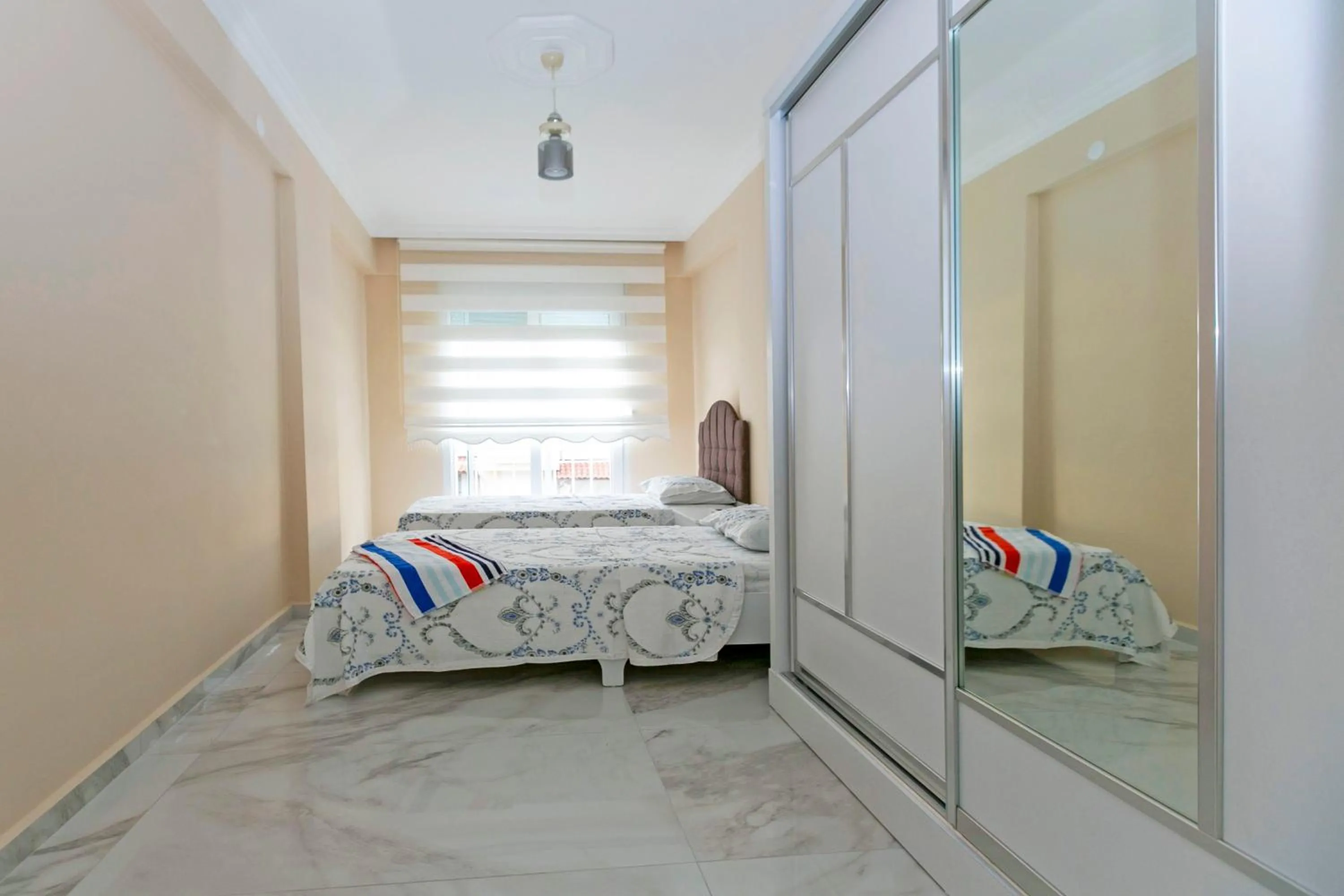 Bed in Paradise Town Villa Legend